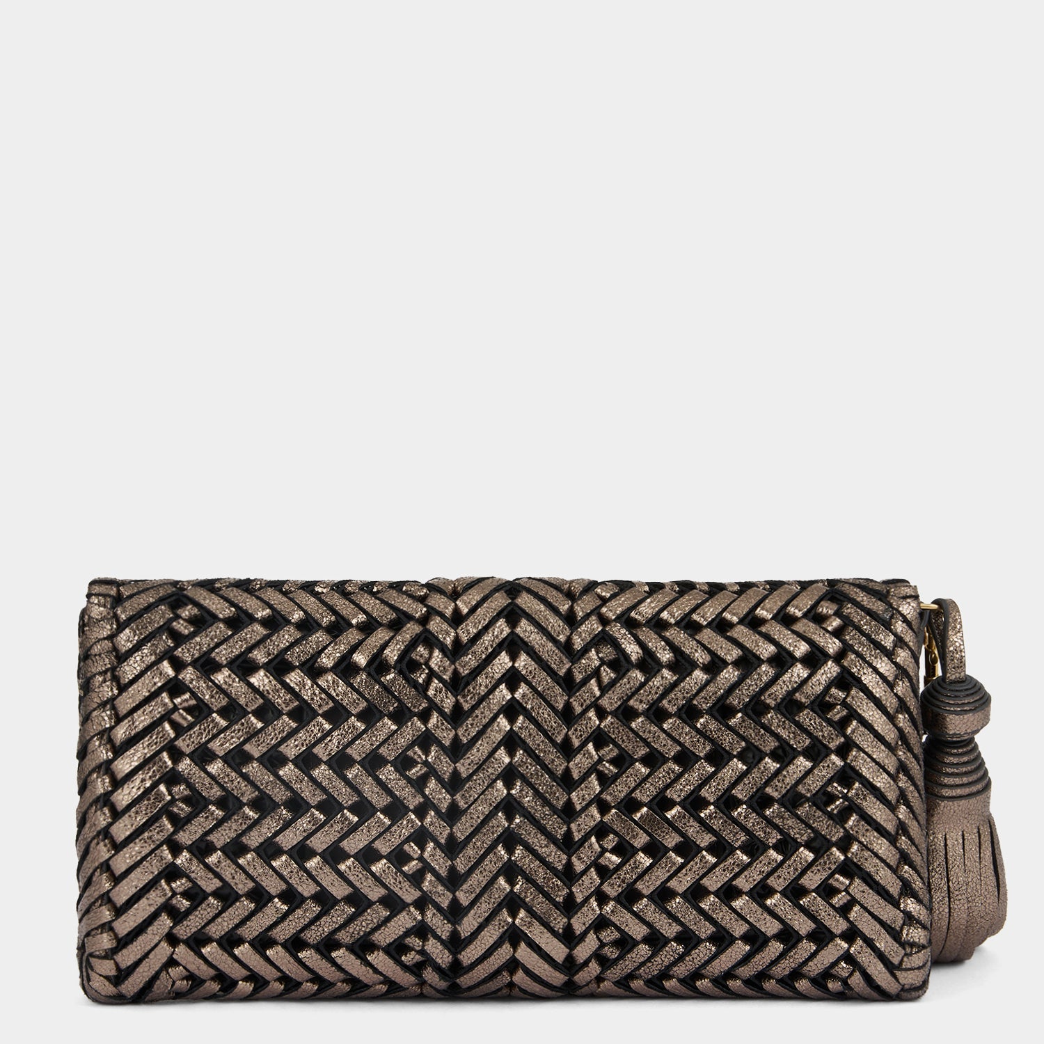 Neeson Tassel Clutch -

          
            Capra Leather in Smog -
          

          Anya Hindmarch US
