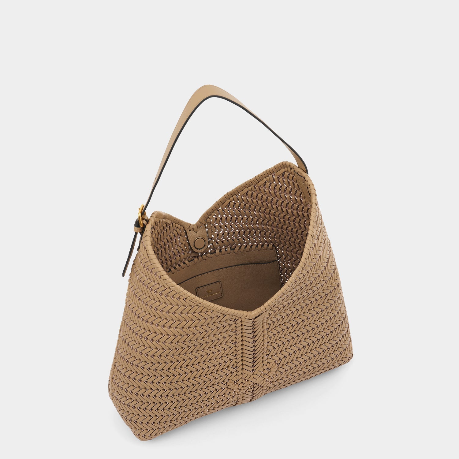 Neeson Tassel Hobo Bag -

          
            Capra Leather in Sand -
          

          Anya Hindmarch US
