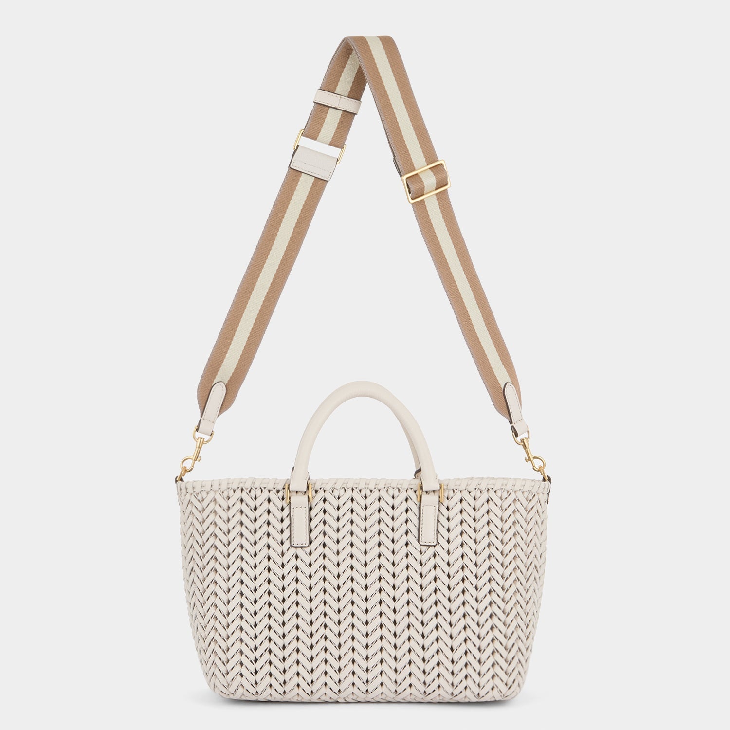 Neeson Pocket Small Cross-body Tote -

          
            Capra Leather in Chalk -
          

          Anya Hindmarch US
