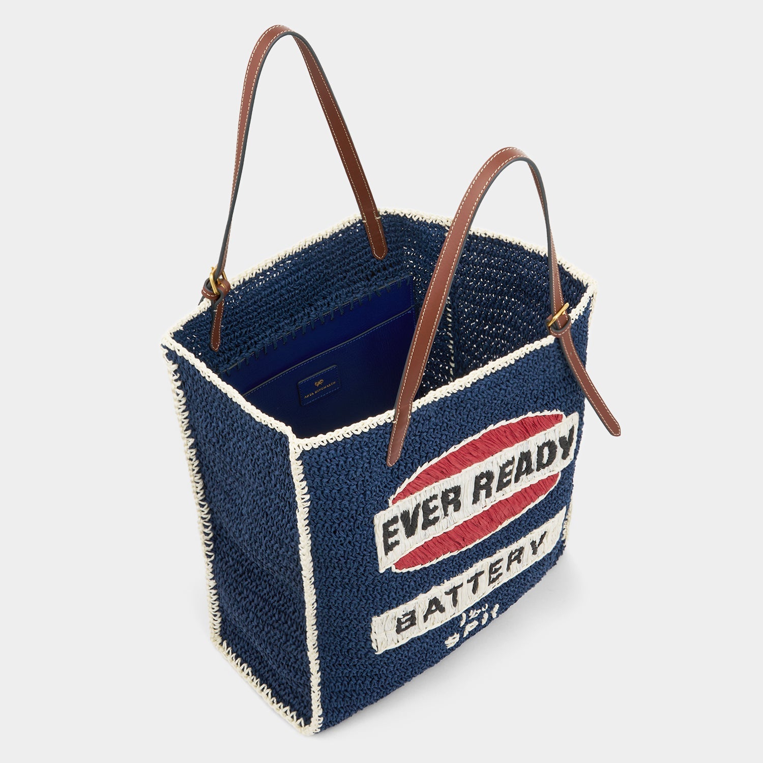 Anya Brands Ever Ready Raffia Tote -

          
            Paper Raffia in Dark Blue -
          

          Anya Hindmarch US
