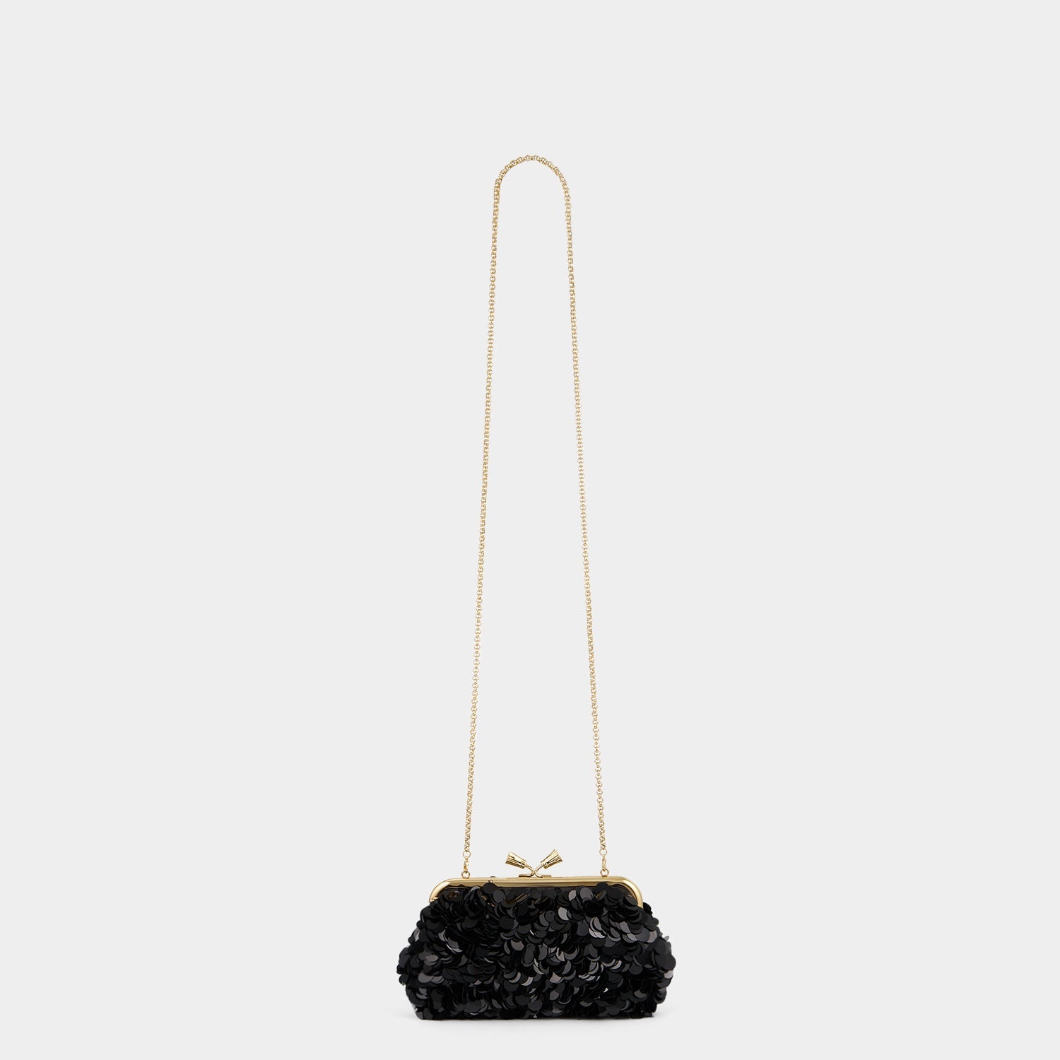 Maud Embellished Tassel Clutch -

          
            Sequins in Black -
          

          Anya Hindmarch US
