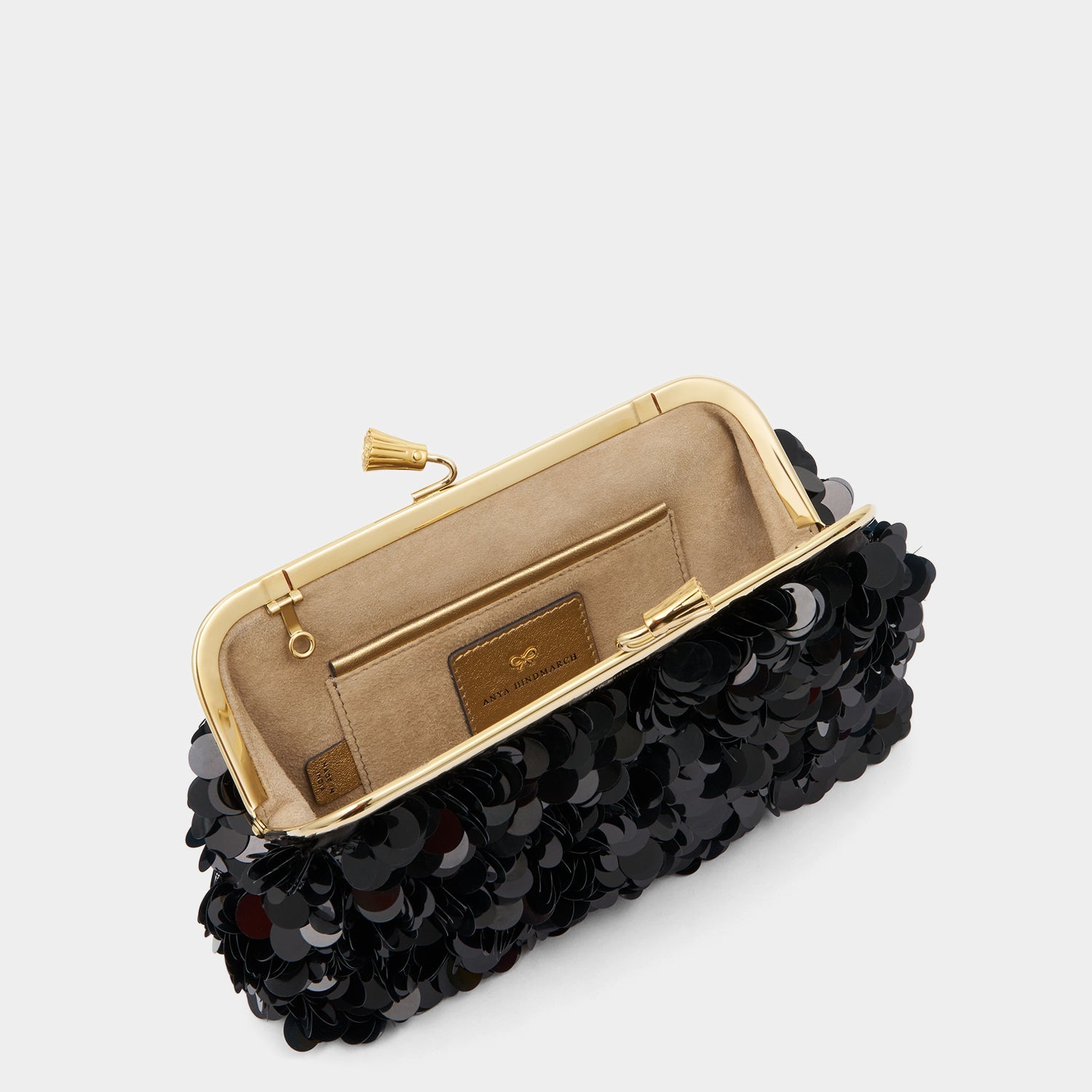 Maud Embellished Tassel Clutch -

          
            Sequins in Black -
          

          Anya Hindmarch US
