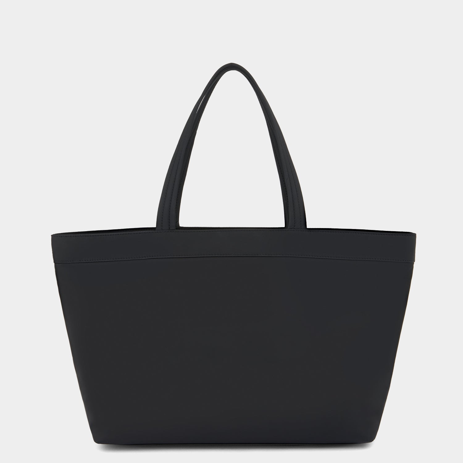 E/W Multi Pocket Tote -

                  
                    Regenerated ECONYL® in Black -
                  

                  Anya Hindmarch US
