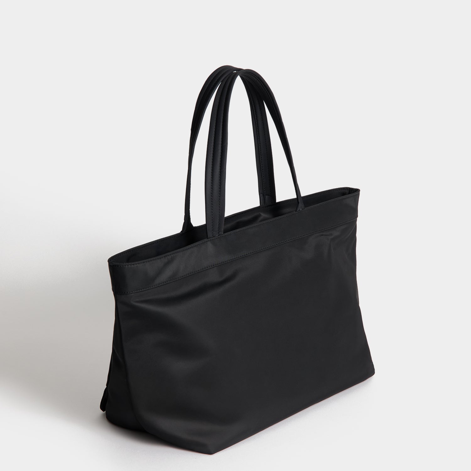 E/W Multi Pocket Tote -

          
            Regenerated ECONYL® in Black -
          

          Anya Hindmarch US
