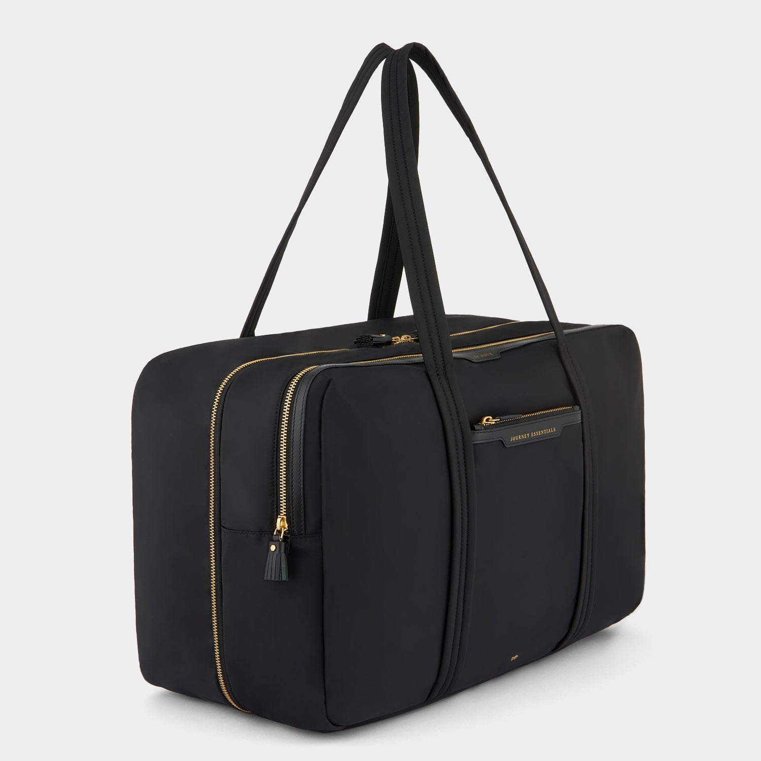24 Hour Travel Bag -

          
            Regenerated ECONYL® in Black -
          

          Anya Hindmarch US
