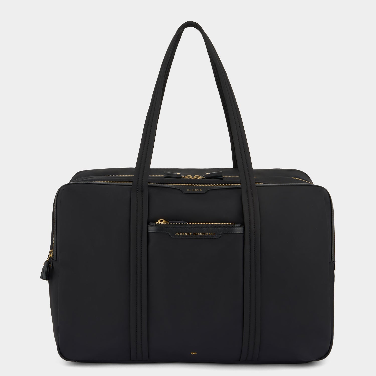 24 Hour Travel Bag -

          
            Regenerated ECONYL® in Black -
          

          Anya Hindmarch US
