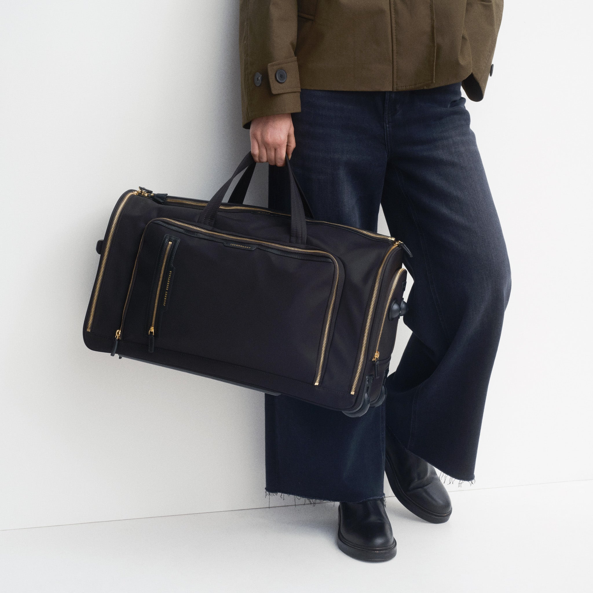 72 Hour Weekend Bag -

          
            Regenerated ECONYL® in Black -
          

          Anya Hindmarch US
