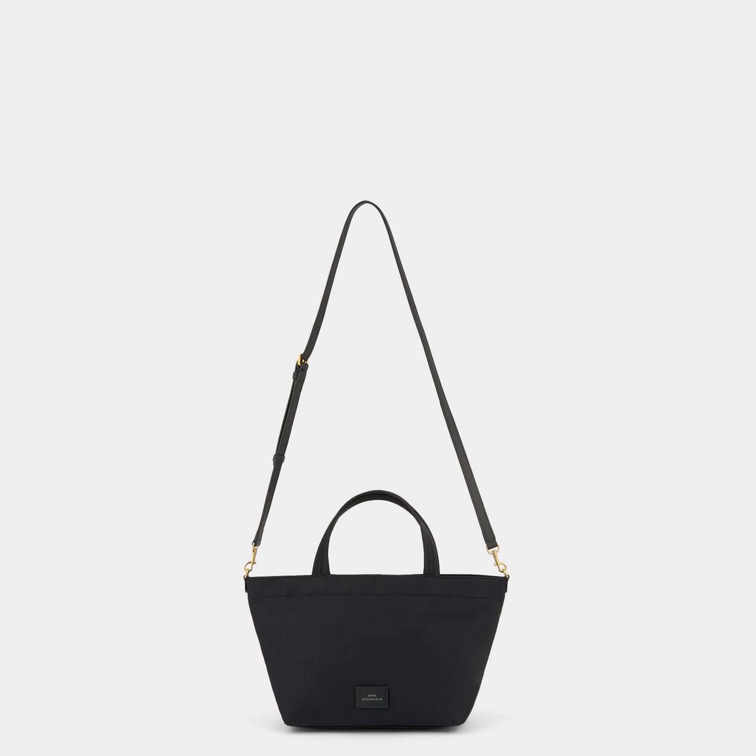 E/W Eyes Mini Cross-body Tote -

          
            Regenerated ECONYL® in Black -
          

          Anya Hindmarch US
