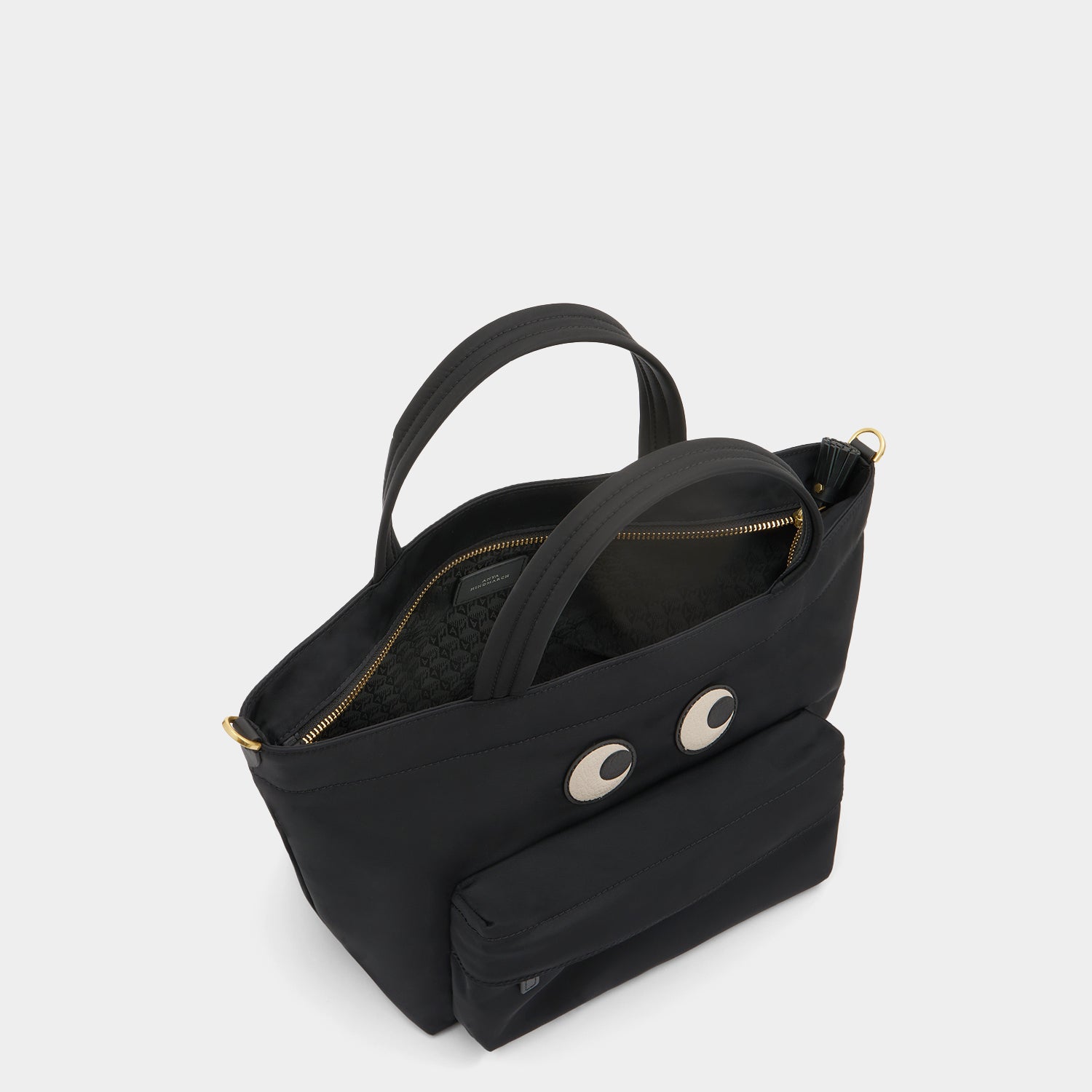 E/W Eyes Mini Cross-body Tote -

          
            Regenerated ECONYL® in Black -
          

          Anya Hindmarch US
