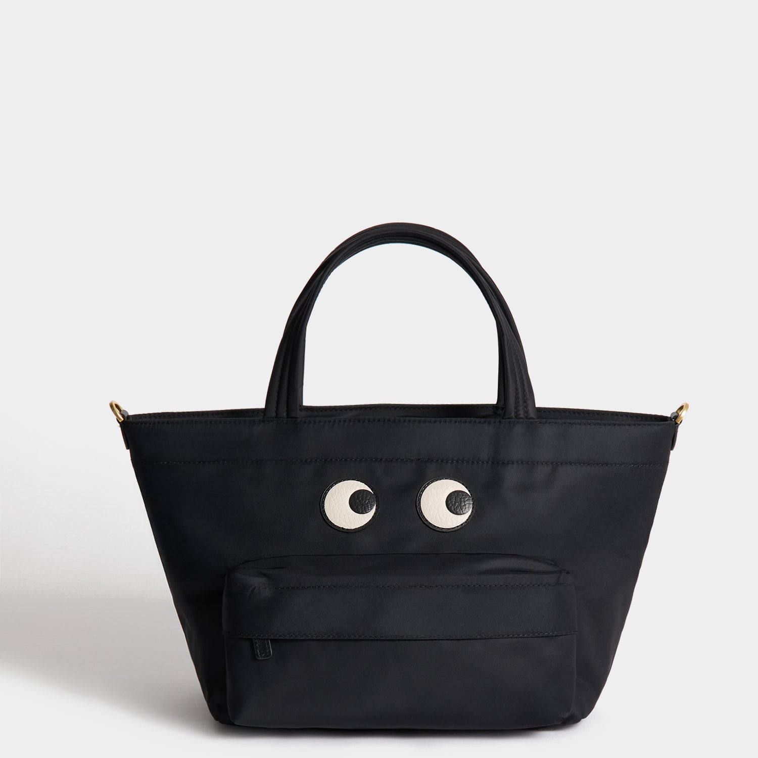 E/W Eyes Mini Cross-body Tote -

          
            Regenerated ECONYL® in Black -
          

          Anya Hindmarch US
