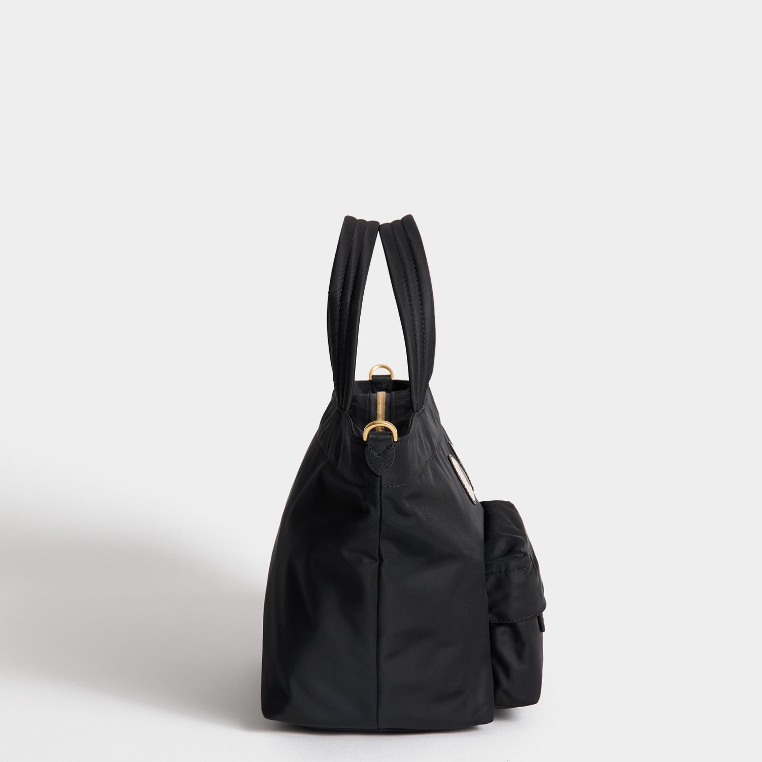 E/W Eyes Mini Cross-body Tote -

          
            Regenerated ECONYL® in Black -
          

          Anya Hindmarch US
