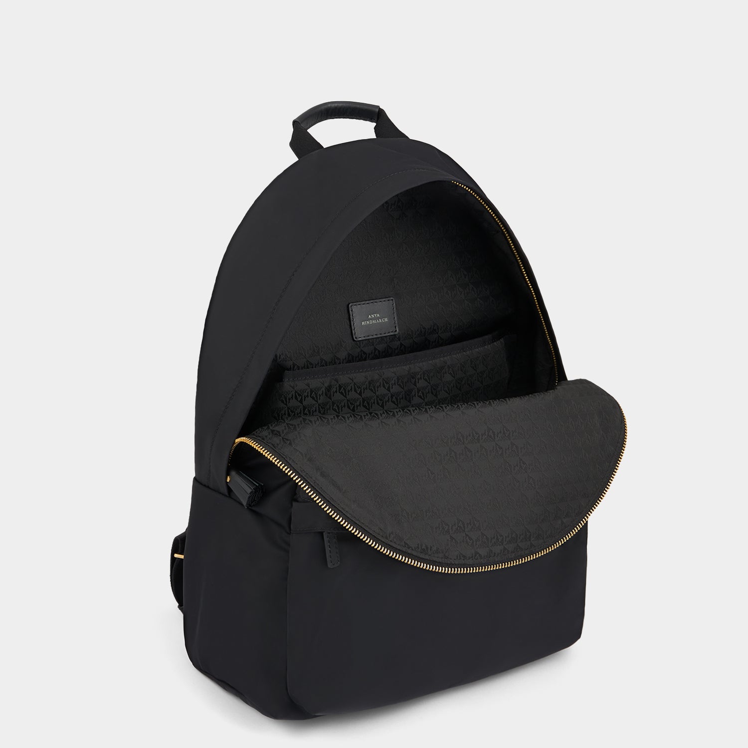 Eyes Backpack -

          
            Regenerated ECONYL® Nylon in Black -
          

          Anya Hindmarch US
