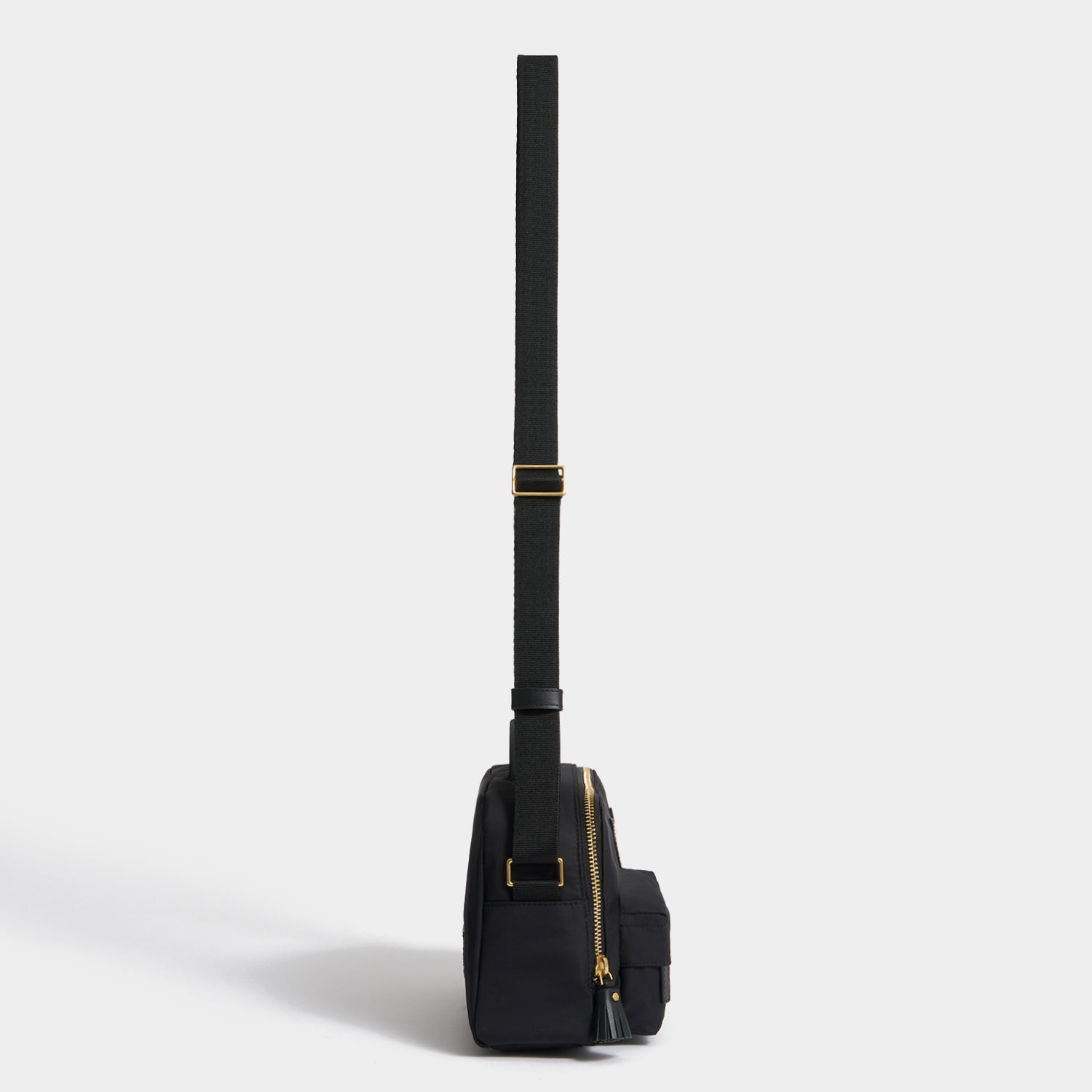 Eyes Cross-body -

          
            Regenerated ECONYL® in Black -
          

          Anya Hindmarch US
