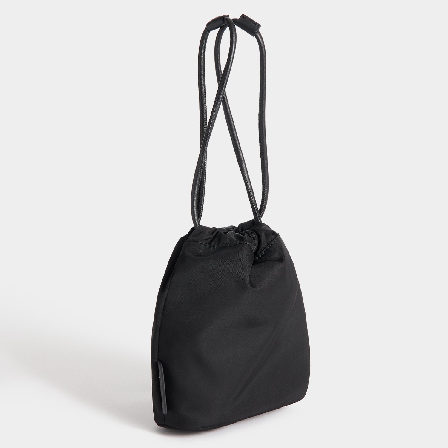 Eyes Drawstring Pouch -

          
            Regenerated ECONYL® in Black -
          

          Anya Hindmarch US
