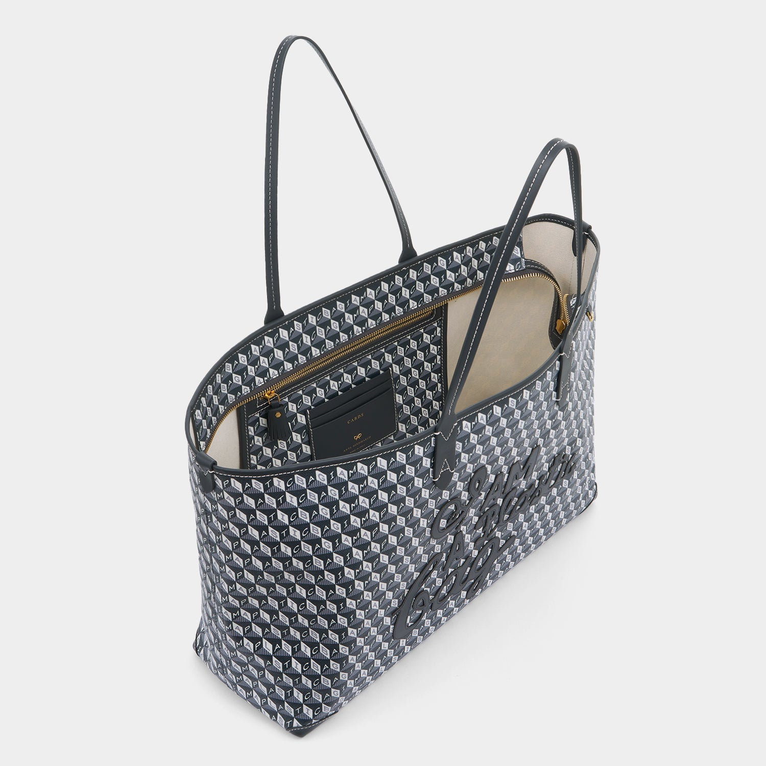 I Am A Plastic Bag Zipped Motif Tote -

          
            Recycled Canvas in Charcoal -
          

          Anya Hindmarch US
