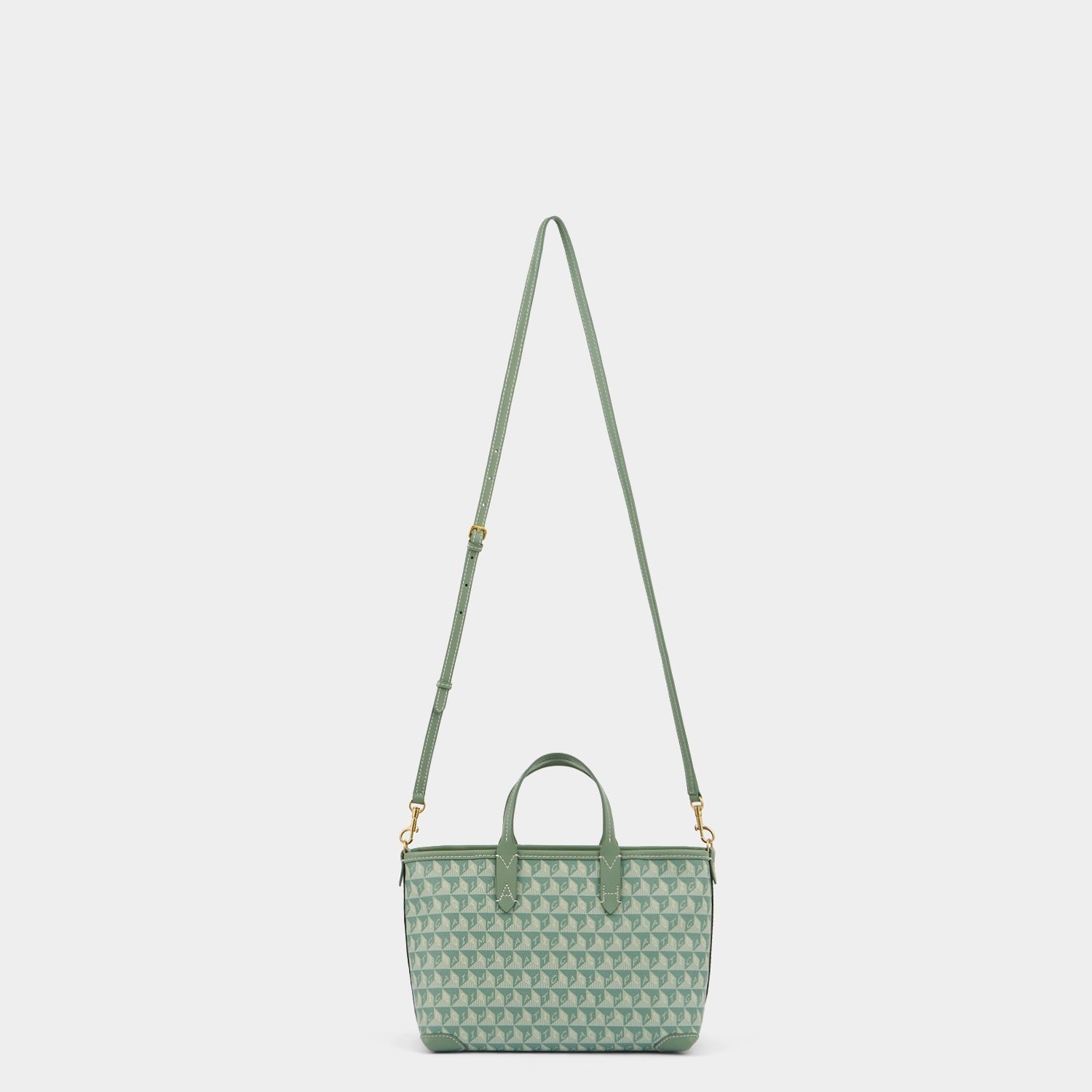 I Am A Plastic Bag XS Eyes Zipped Cross-body Tote -

          
            Recycled Canvas in Moss -
          

          Anya Hindmarch US
