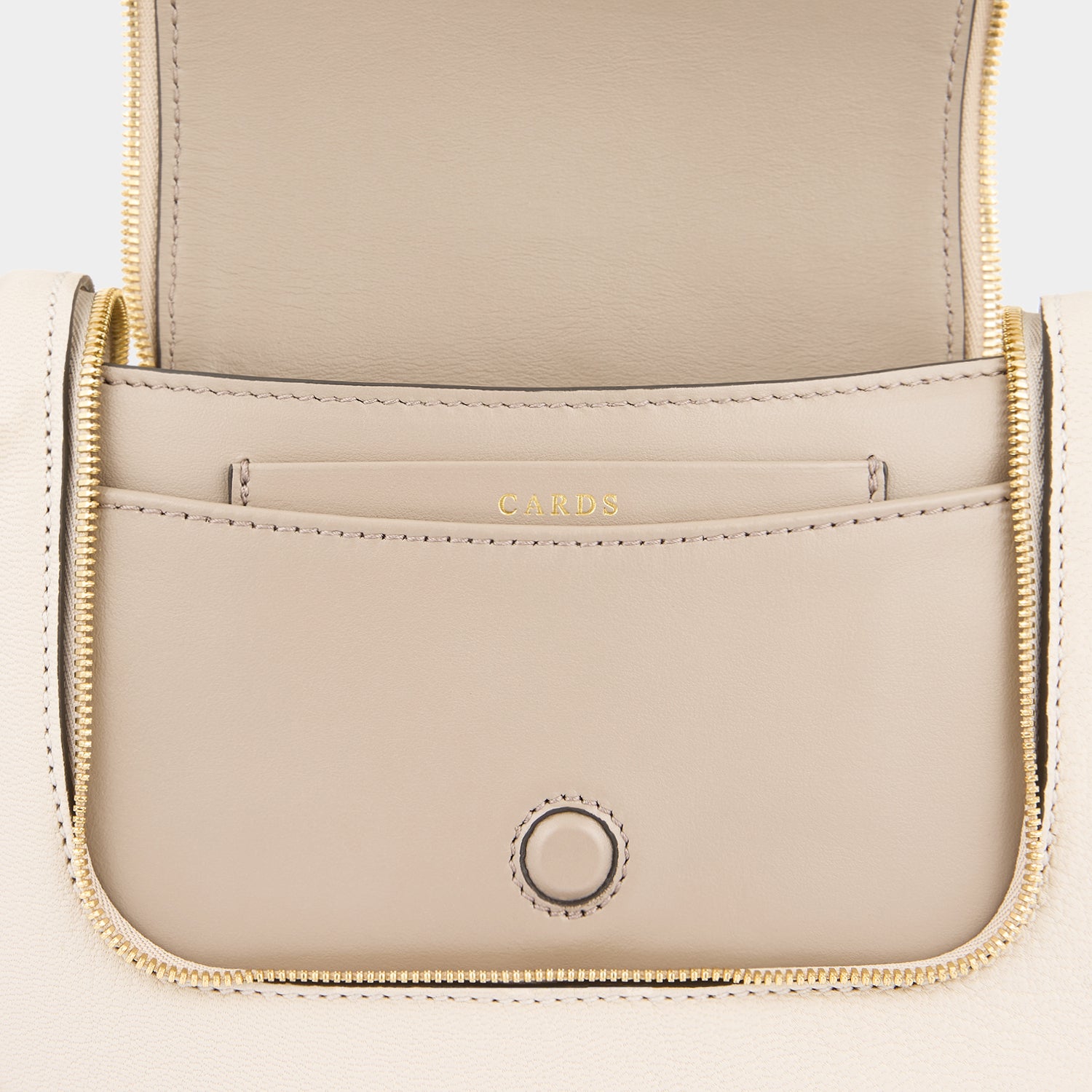 Vere Small Soft Satchel Cross-body -

          
            Grain Leather in Chalk -
          

          Anya Hindmarch US
