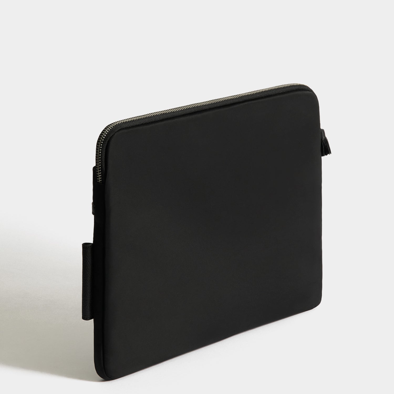 Technology Case -

          
            Regenerated ECONYL® in Black -
          

          Anya Hindmarch US
