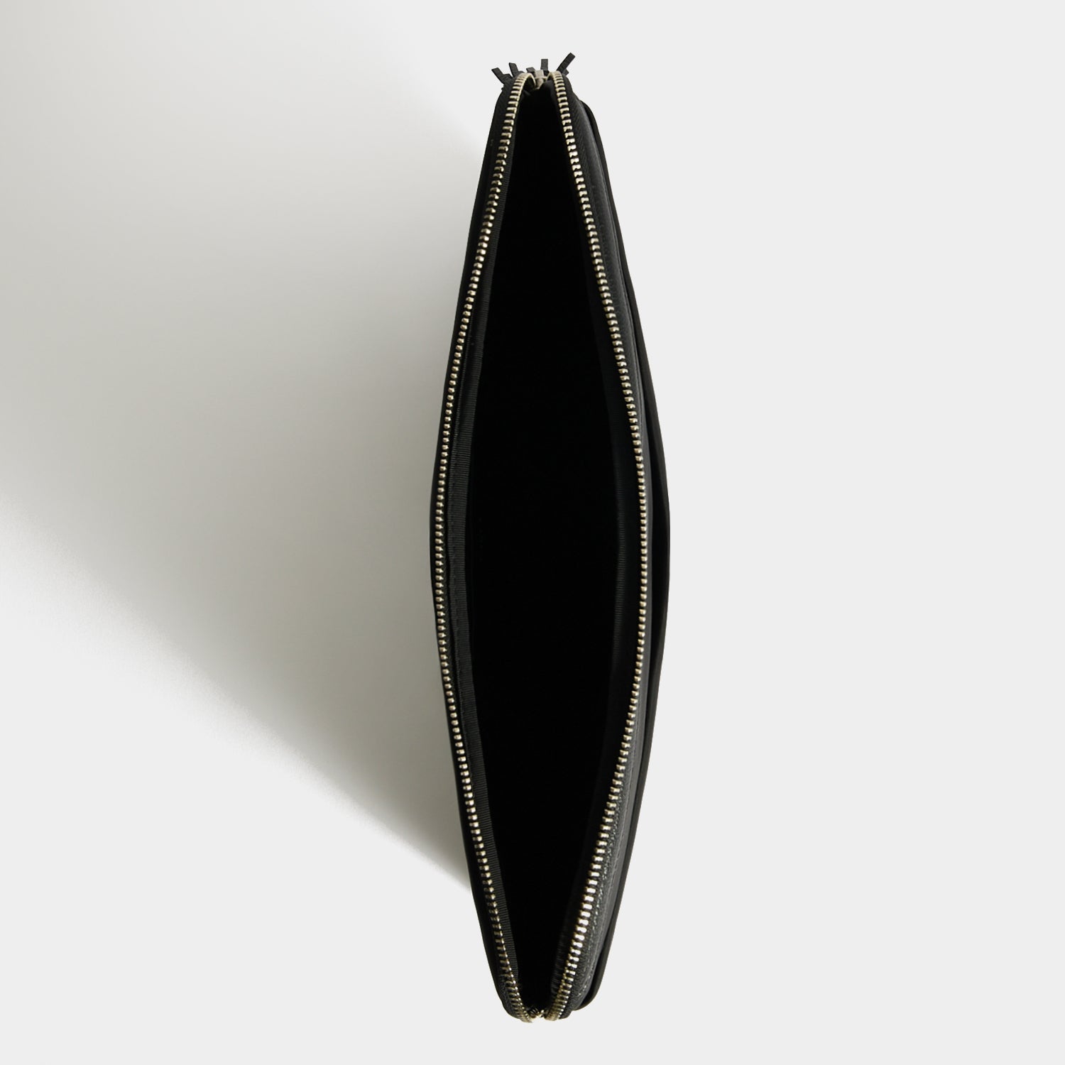 Technology Case -

          
            Regenerated ECONYL® in Black -
          

          Anya Hindmarch US
