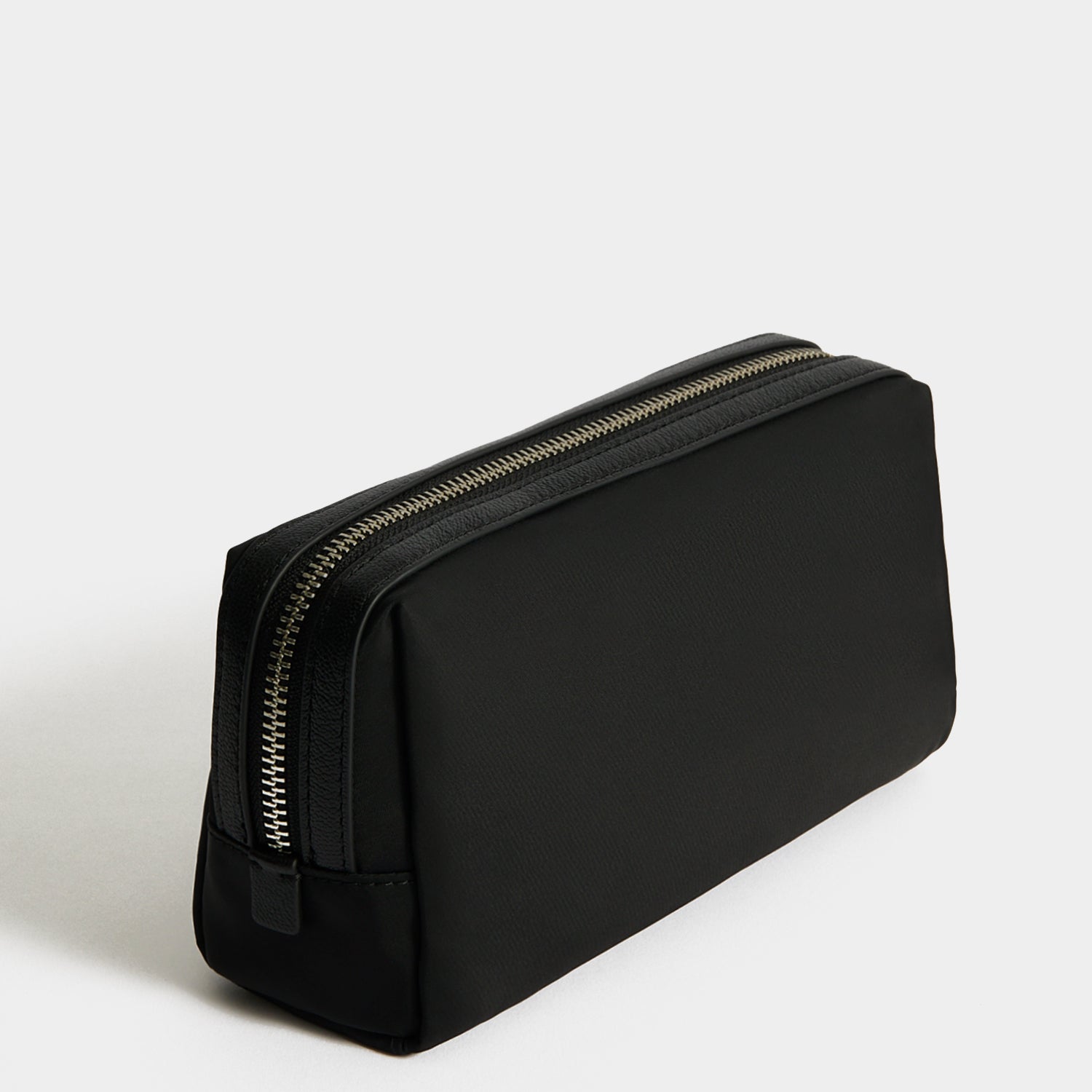 Cables & Chargers Pouch -

          
            Regenerated ECONYL® in Black -
          

          Anya Hindmarch US
