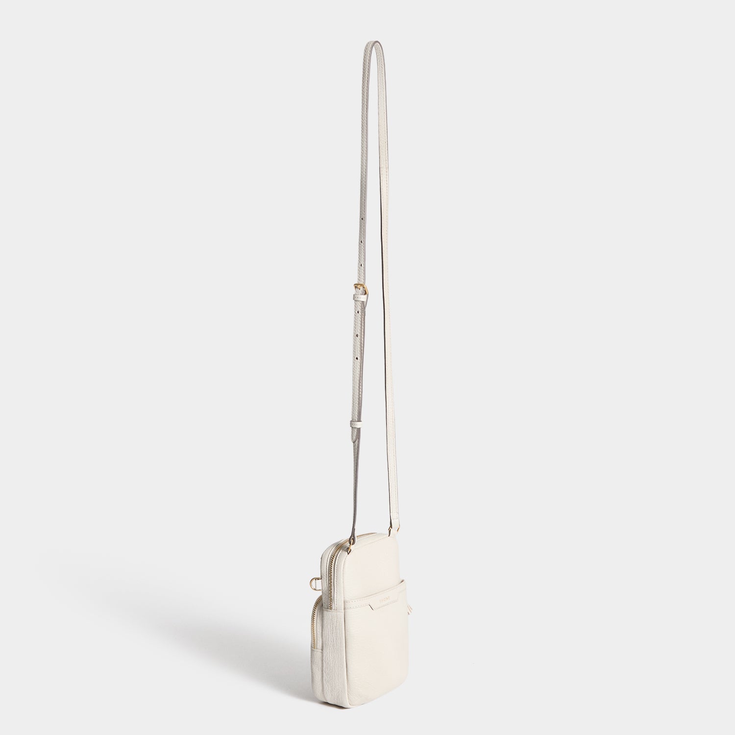 All Over Stickers Essential Cross-body -

          
            Capra Leather in Chalk -
          

          Anya Hindmarch US
