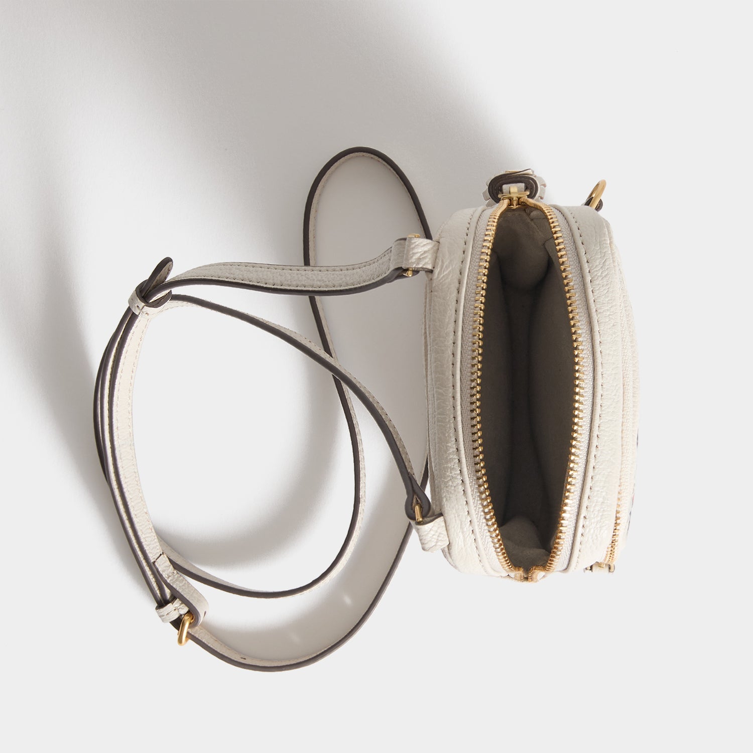 All Over Stickers Essential Cross-body -

          
            Capra Leather in Chalk -
          

          Anya Hindmarch US
