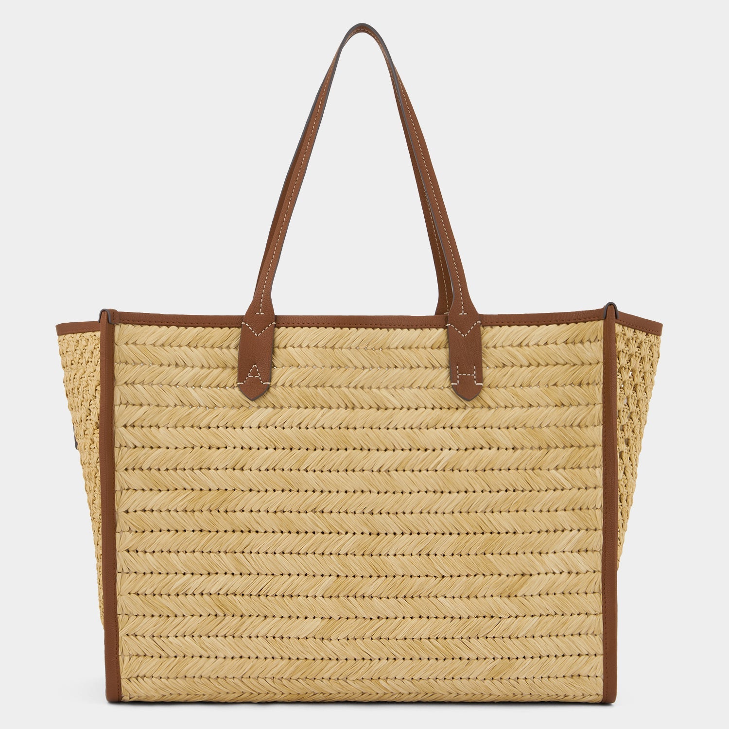 Raffia Pocket Tote -

          
            Raffia in Cedar -
          

          Anya Hindmarch US
