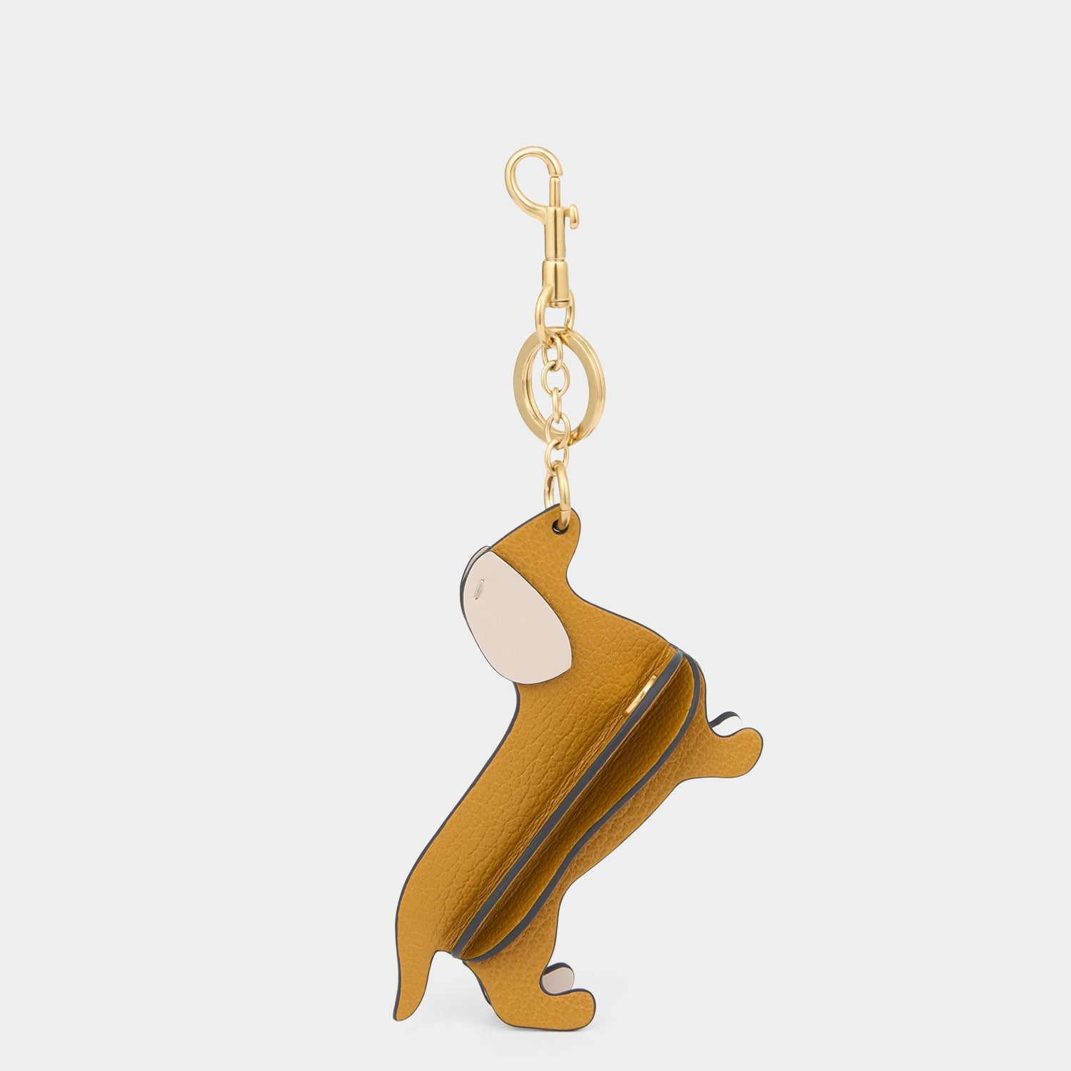 Dog Charm -

          
            Capra Leather in Tumeric -
          

          Anya Hindmarch US
