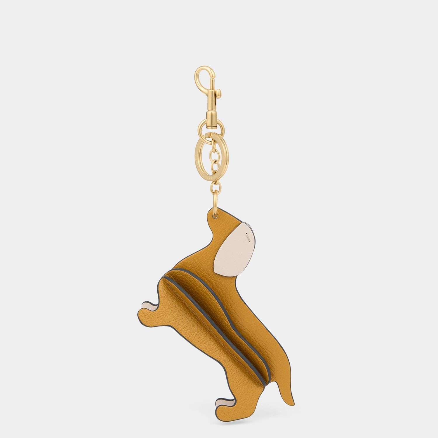 Dog Charm -

          
            Capra Leather in Tumeric -
          

          Anya Hindmarch US
