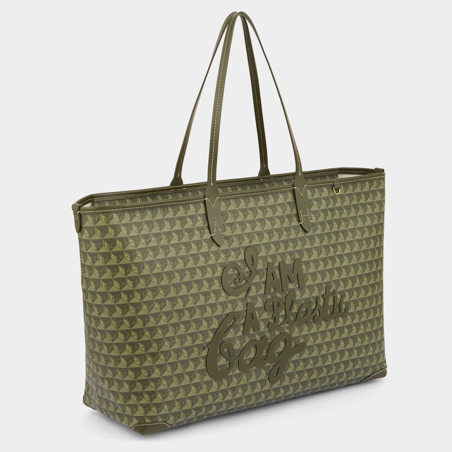 I Am A Plastic Bag Zipped Motif Tote -

          
            Recycled Canvas in Fern -
          

          Anya Hindmarch US
