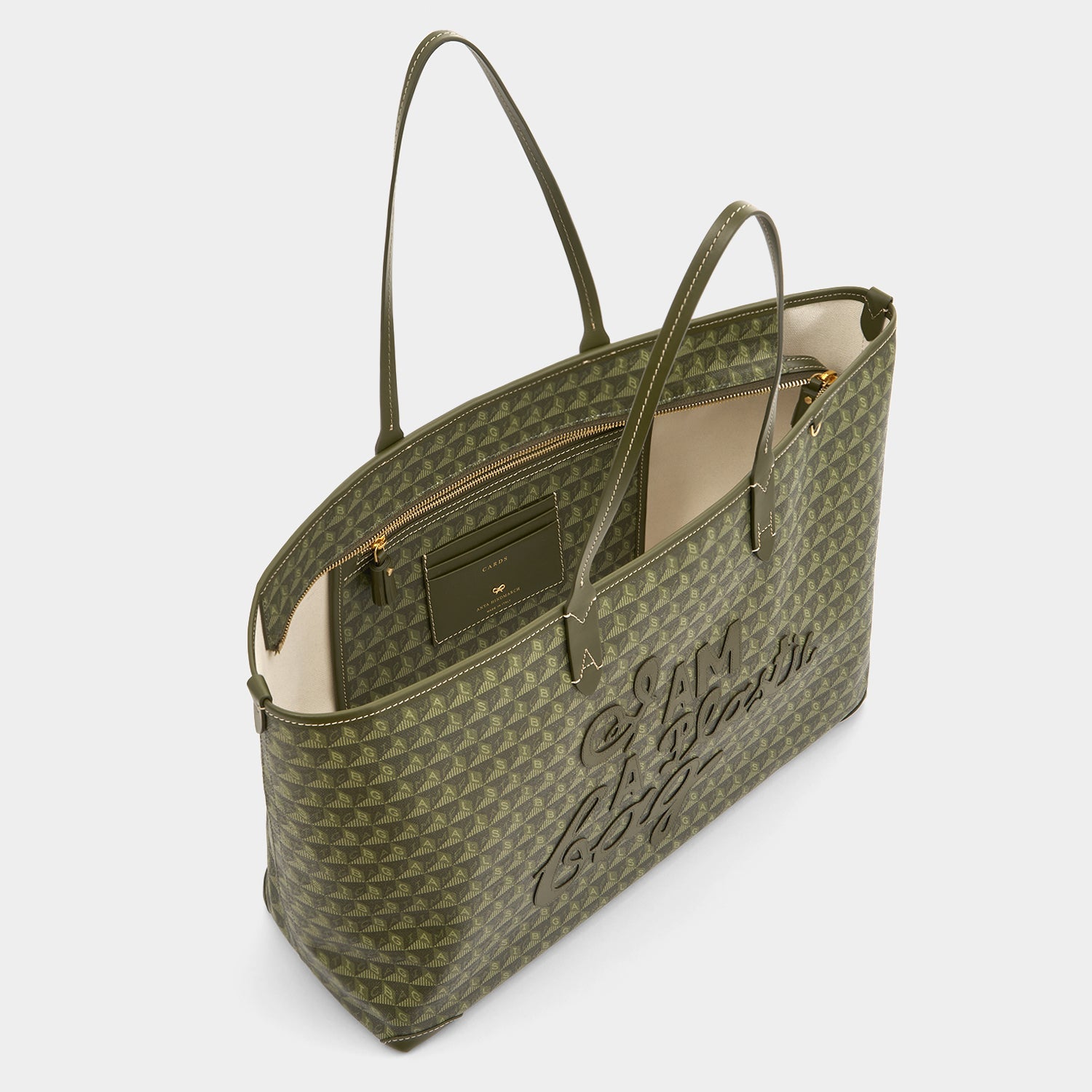 I Am A Plastic Bag Zipped Motif Tote -

          
            Recycled Canvas in Fern -
          

          Anya Hindmarch US
