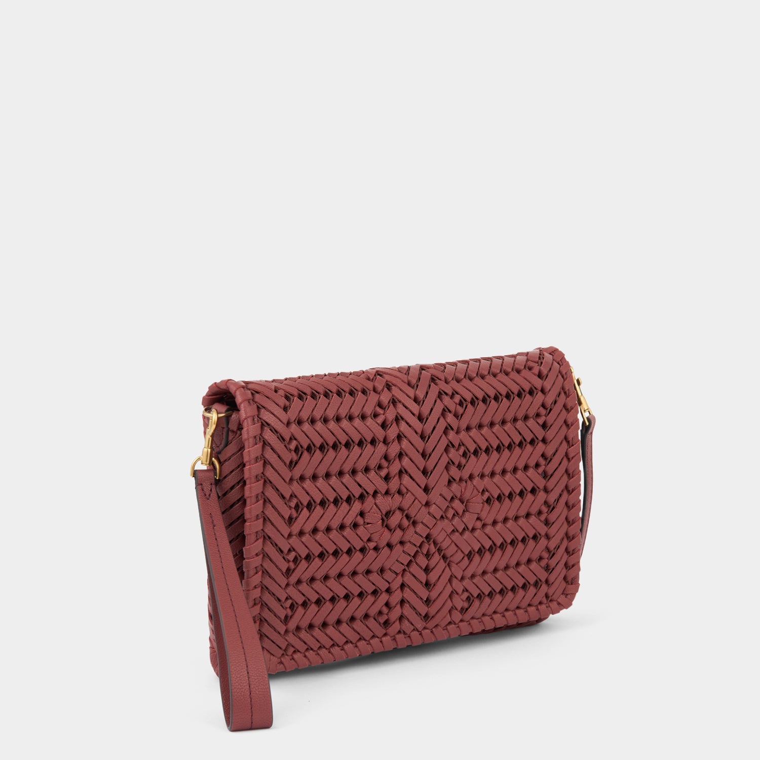 Neeson Cross-body -

          
            Capra Leather in Damson -
          

          Anya Hindmarch US
