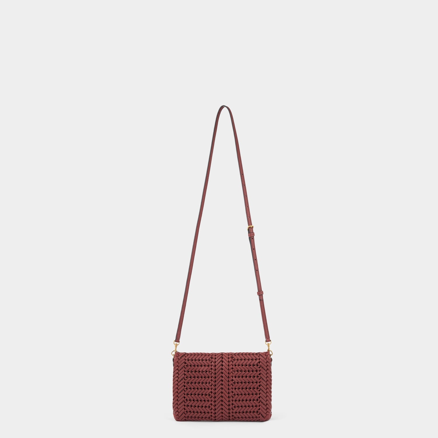 Neeson Cross-body -

          
            Capra Leather in Damson -
          

          Anya Hindmarch US
