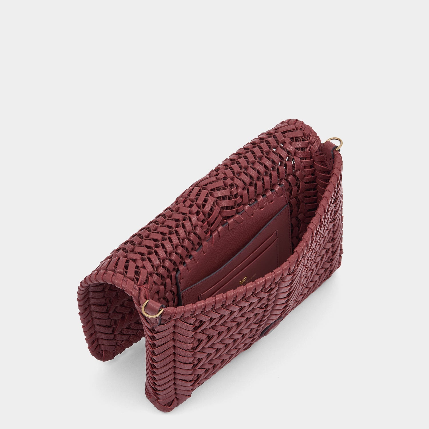 Neeson Cross-body -

          
            Capra Leather in Damson -
          

          Anya Hindmarch US
