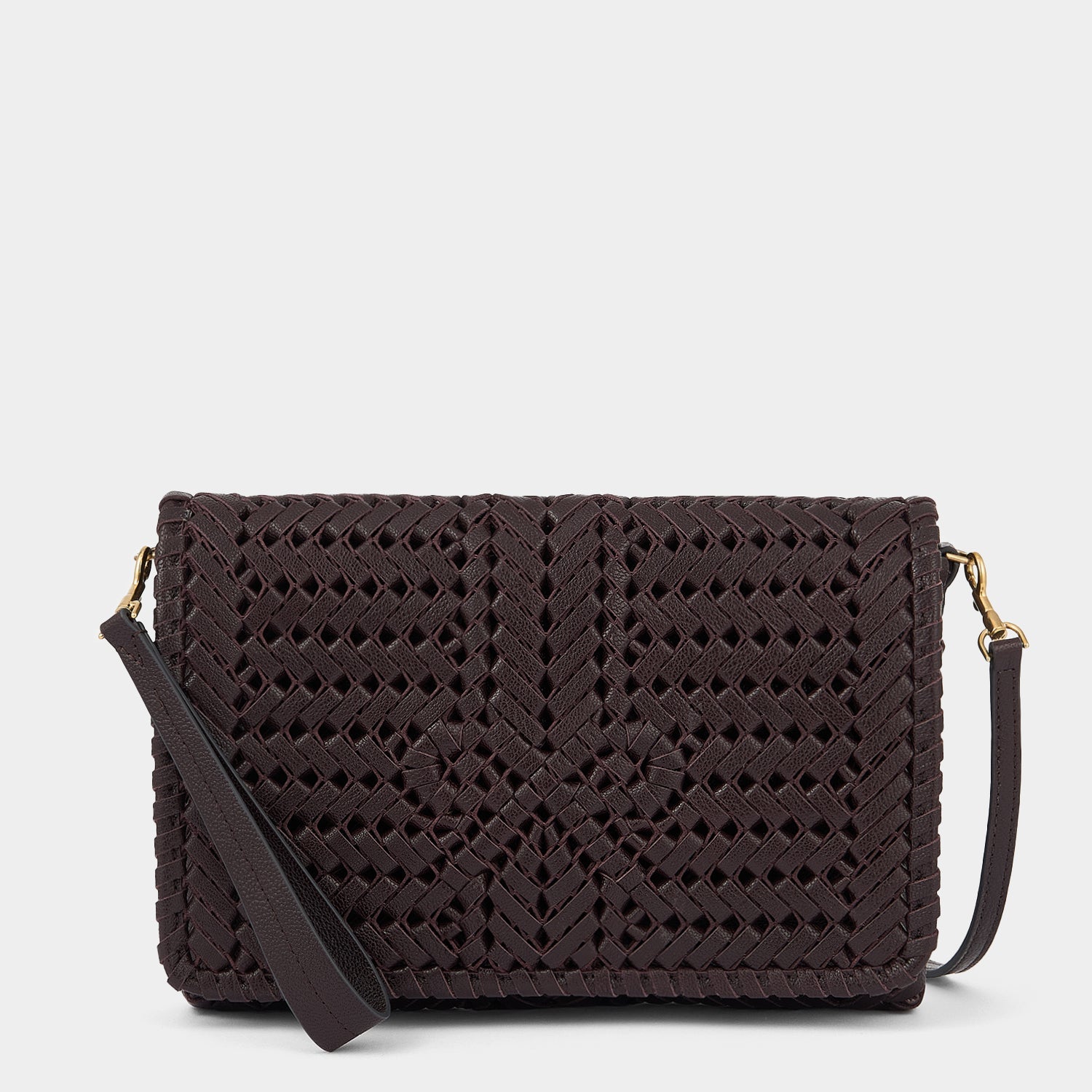 Neeson Cross-body -

          
            Capra Leather in Grape -
          

          Anya Hindmarch US
