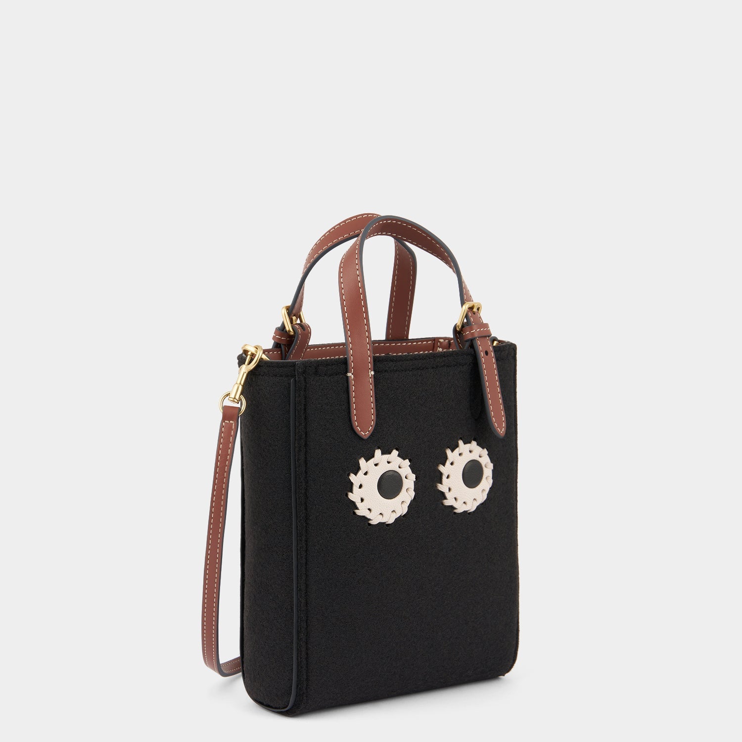 Mini N/S Eyes Felt Cross-body Tote -

          
            Wool Felt in Black -
          

          Anya Hindmarch US
