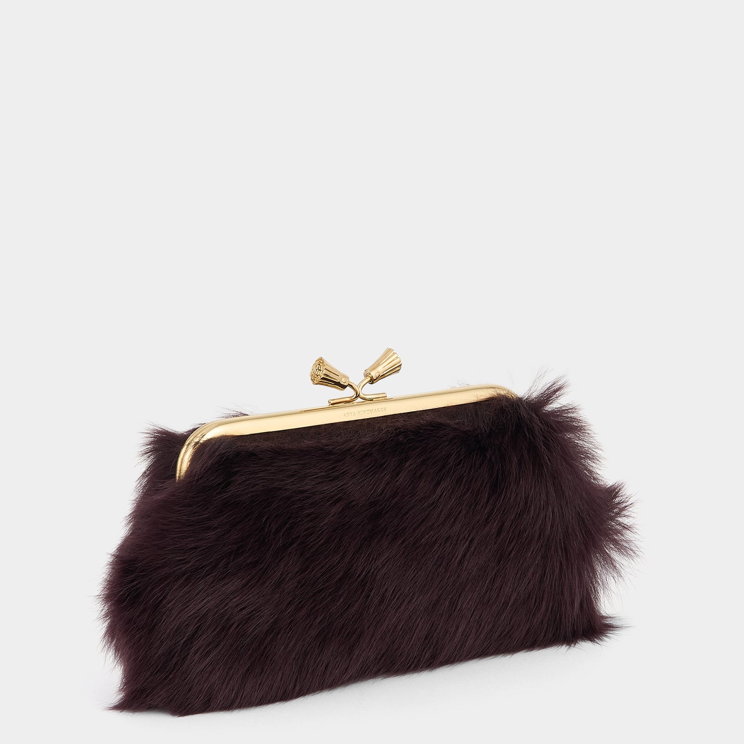 Maud Shearling Tassel Clutch -

          
            Shearling in Burgundy -
          

          Anya Hindmarch US
