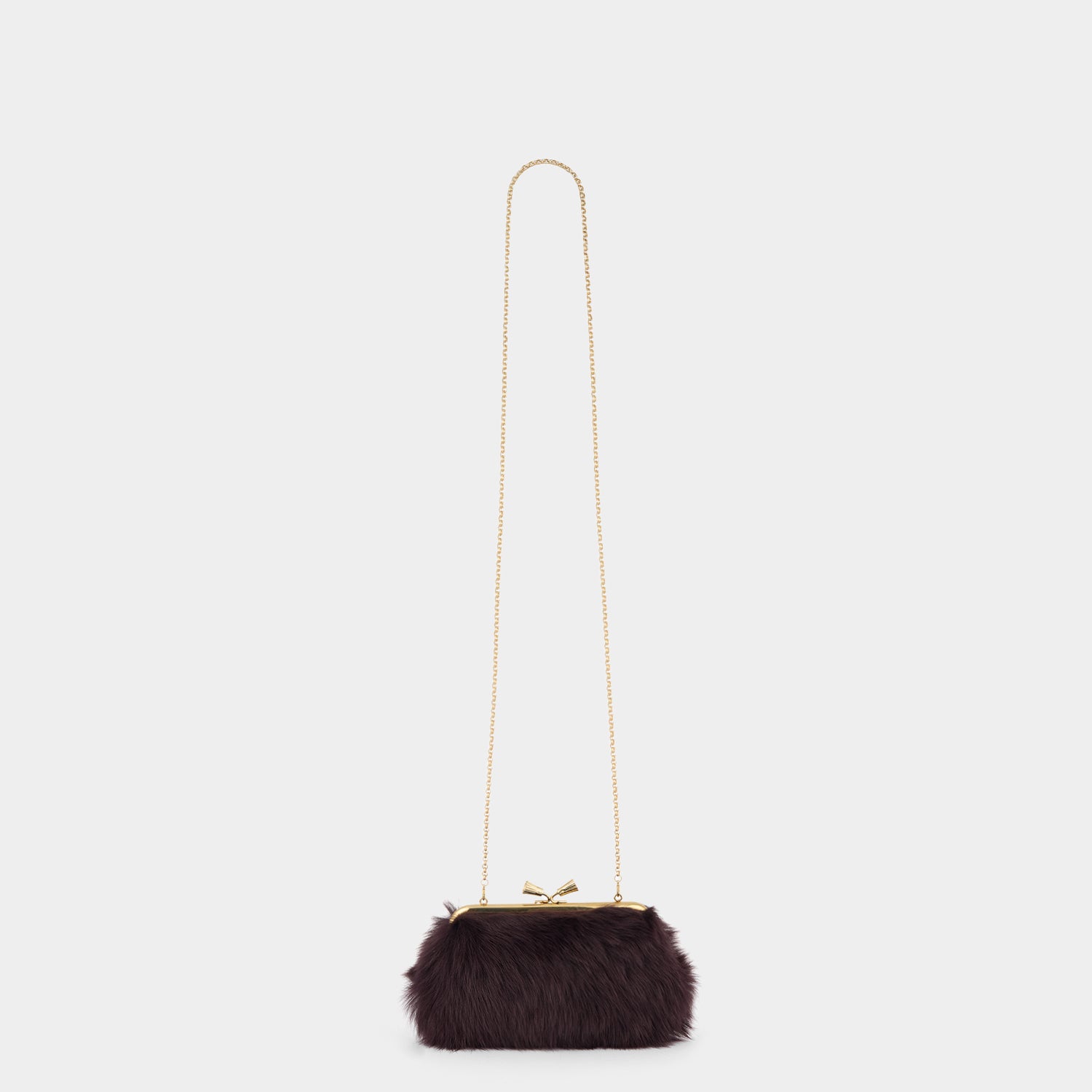 Maud Shearling Tassel Clutch -

          
            Shearling in Burgundy -
          

          Anya Hindmarch US
