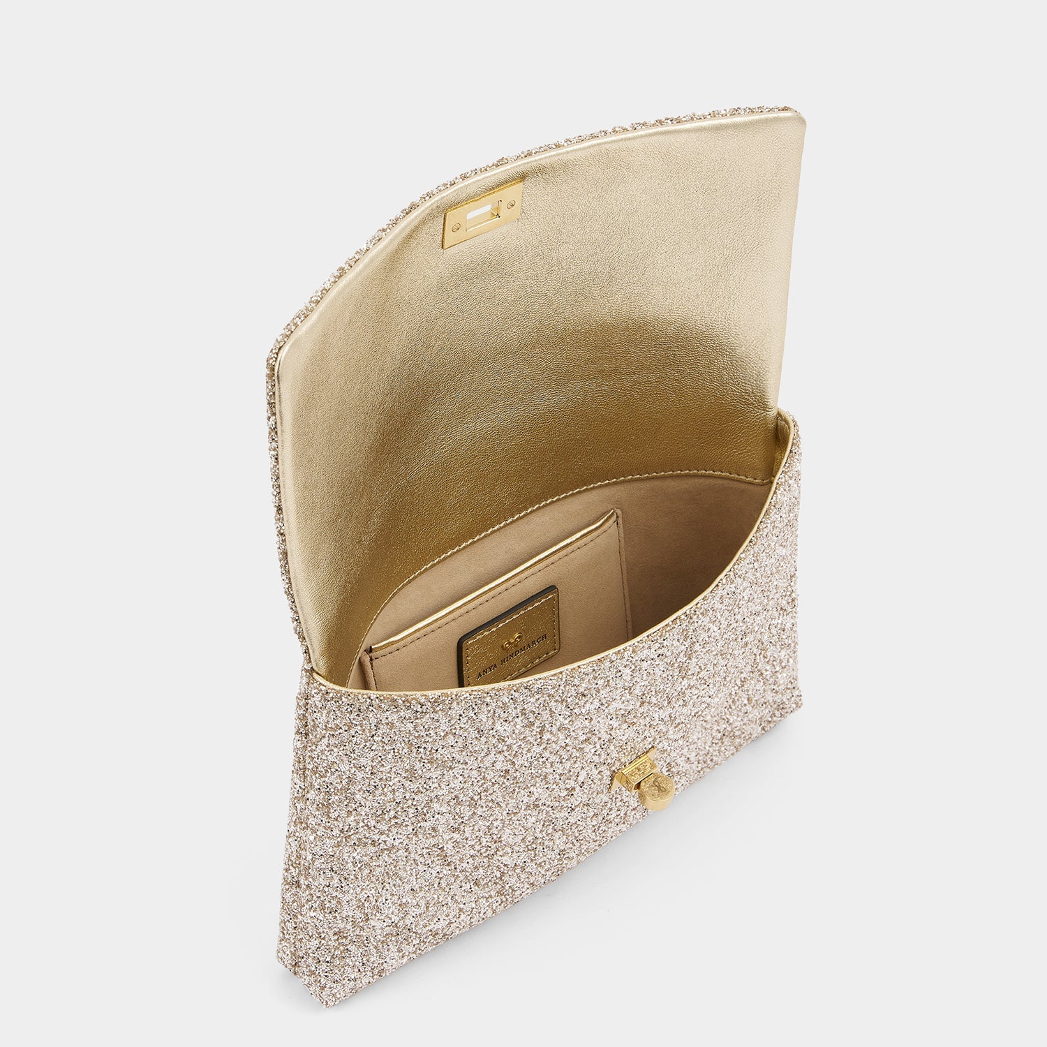 Valorie Clutch -

          
            Glitter in Light Gold -
          

          Anya Hindmarch US
