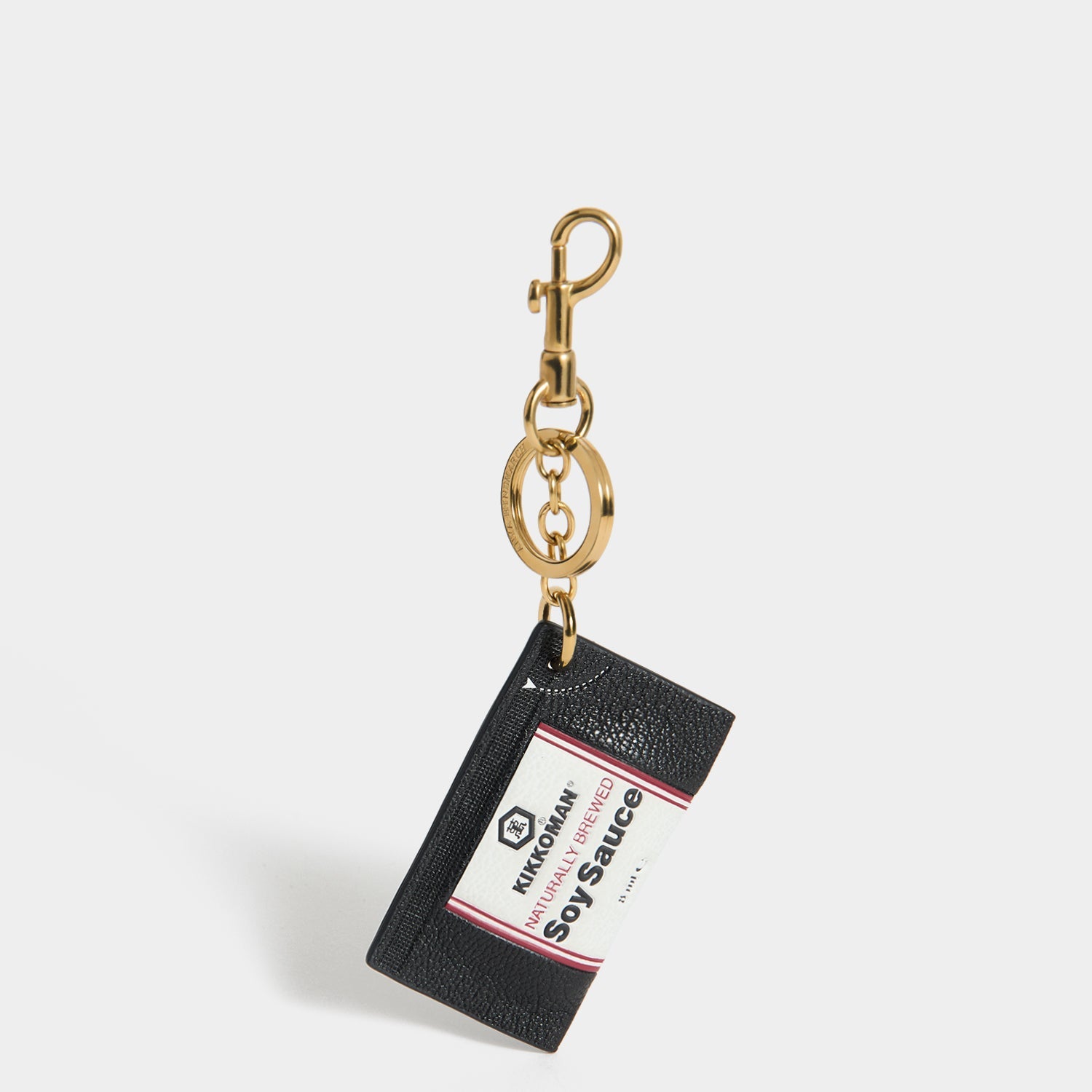 Anya Brands Kikkoman Charm -

          
            Capra Leather in Black -
          

          Anya Hindmarch US
