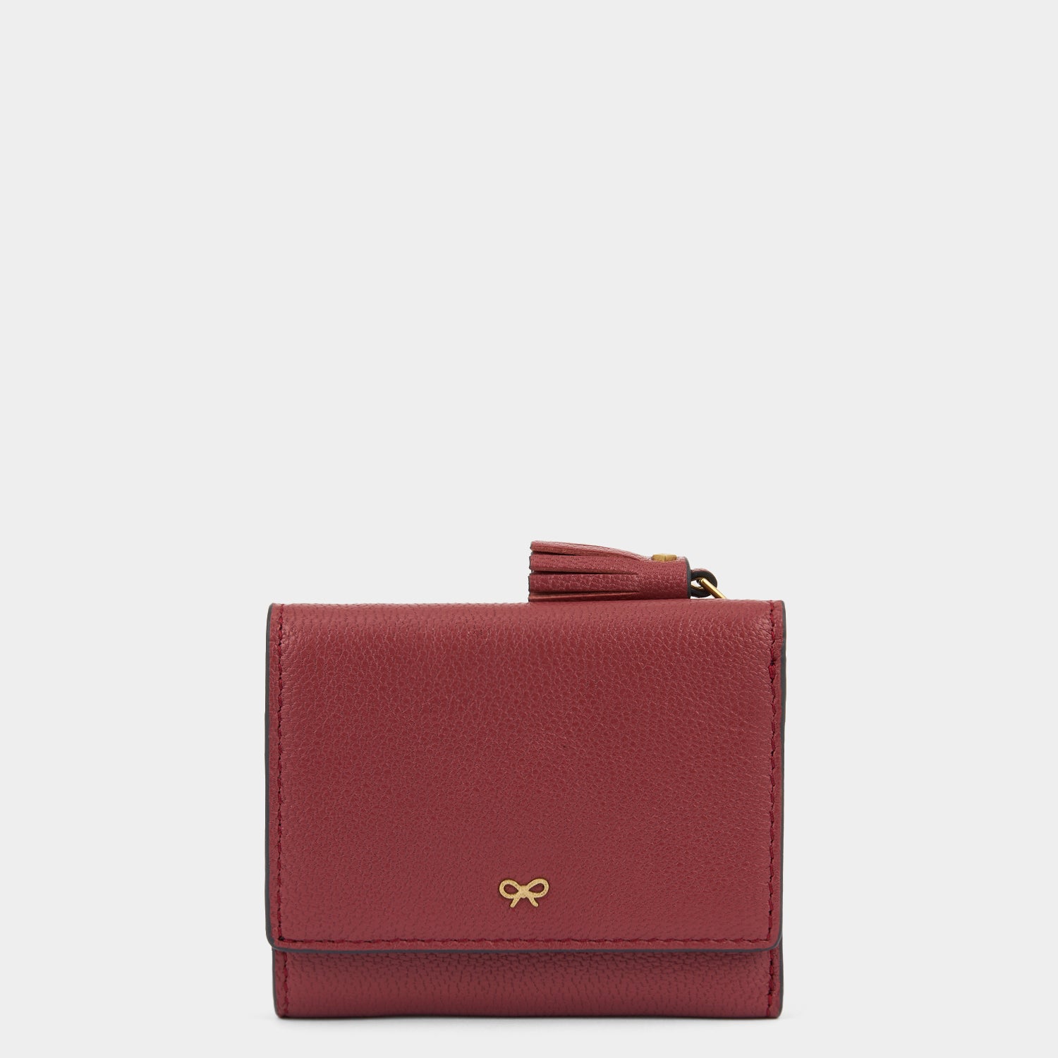 Peeping Eyes Mini Trifold Wallet -

          
            Capra Leather in Damson -
          

          Anya Hindmarch US
