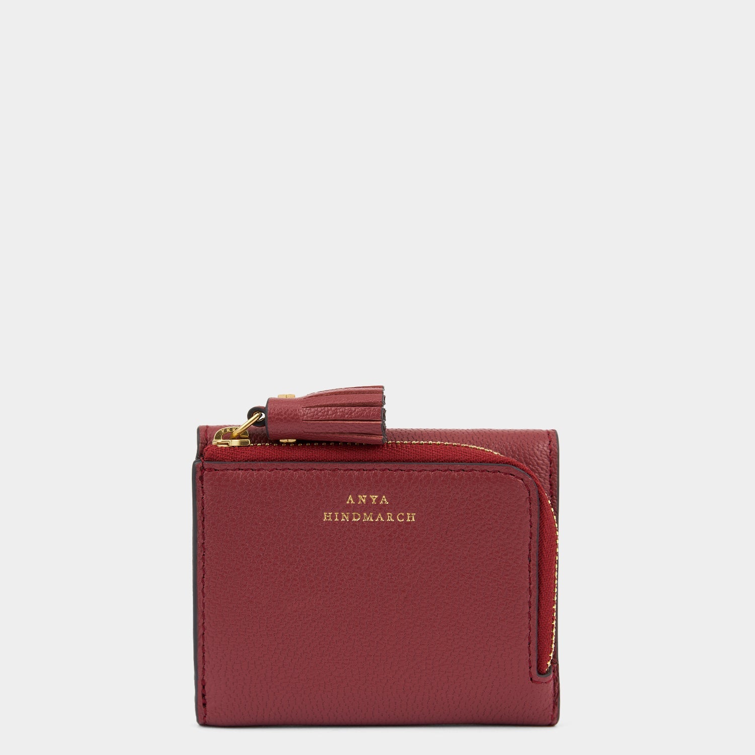 Peeping Eyes Mini Trifold Wallet -

          
            Capra Leather in Damson -
          

          Anya Hindmarch US
