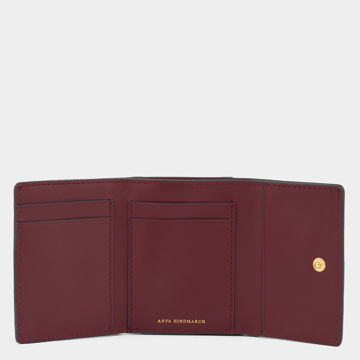 Zany Mini Trifold Wallet -

          
            Capra Leather in Grape -
          

          Anya Hindmarch US
