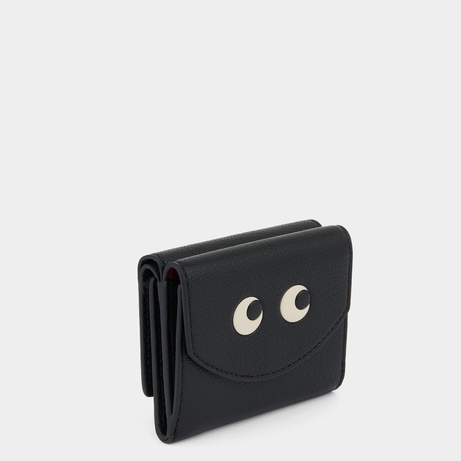 Eyes Mini Trifold Zip Wallet -

          
            Capra Leather in Black -
          

          Anya Hindmarch US
