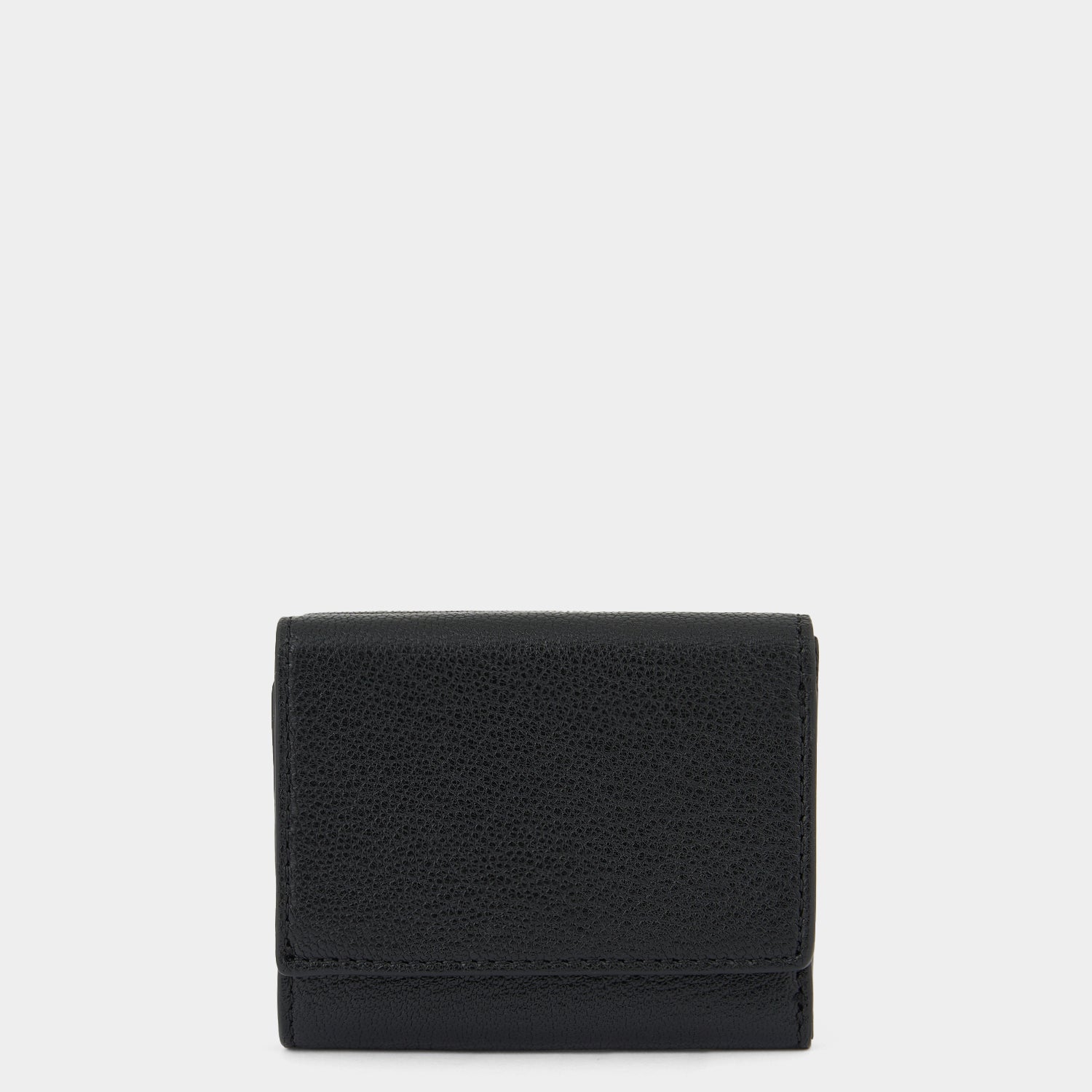 Eyes Mini Trifold Zip Wallet -

          
            Capra Leather in Black -
          

          Anya Hindmarch US
