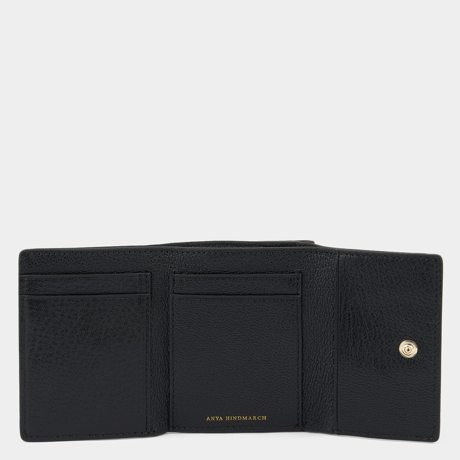 Eyes Mini Trifold Zip Wallet -

          
            Capra Leather in Black -
          

          Anya Hindmarch US
