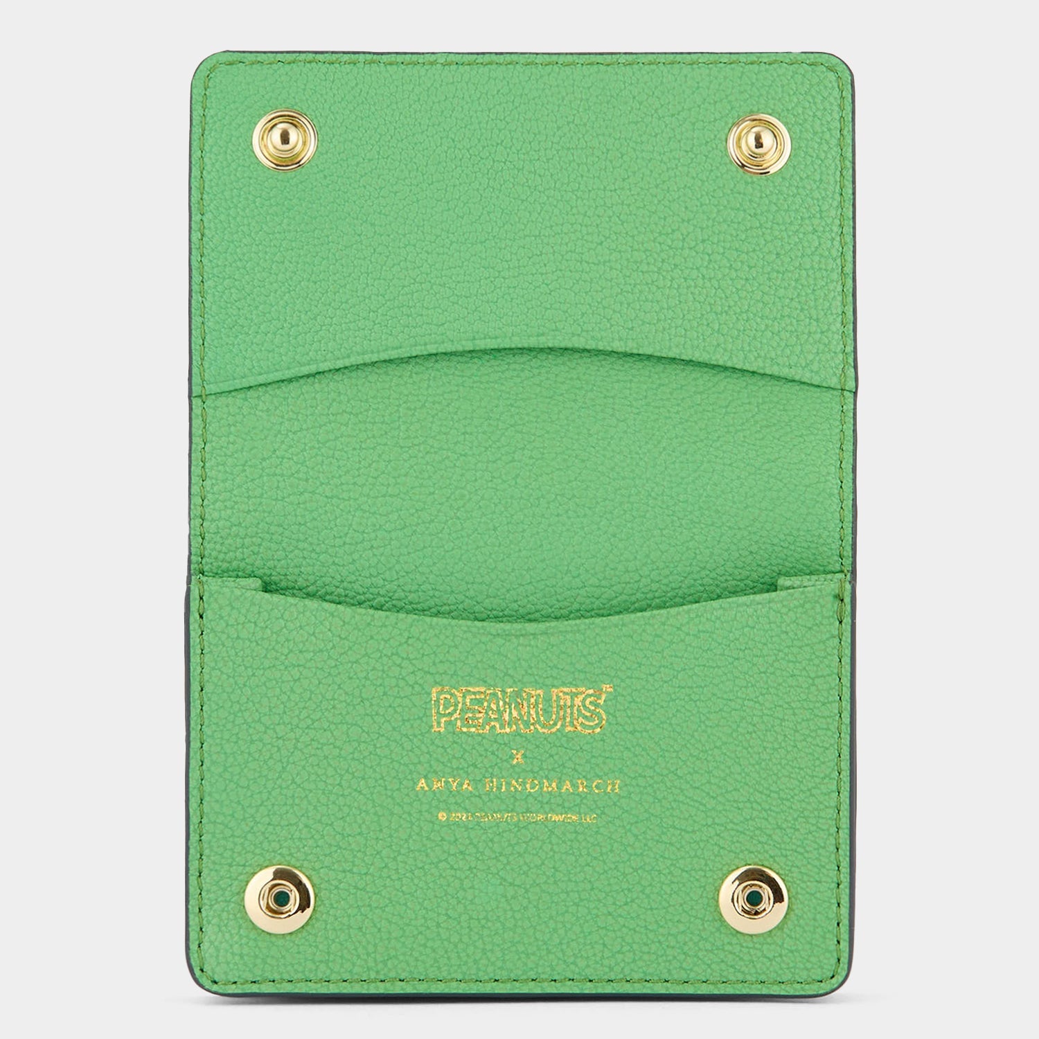 Peanuts Snoopy Business Card Holder -

          
            Capra Leather in Grass Green -
          

          Anya Hindmarch US
