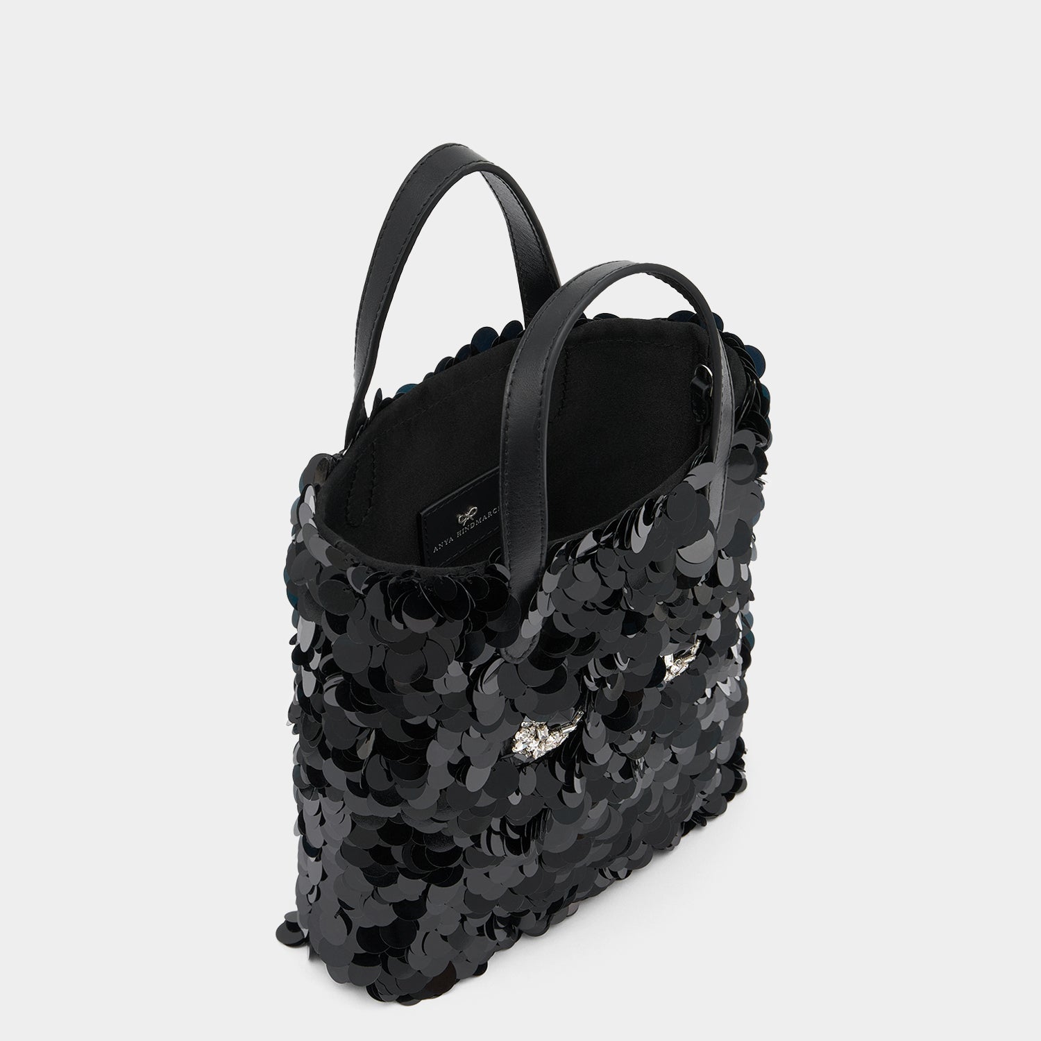 Mini N/S Eyes Embellished Cross-body Tote -

          
            Sequins in Black -
          

          Anya Hindmarch US
