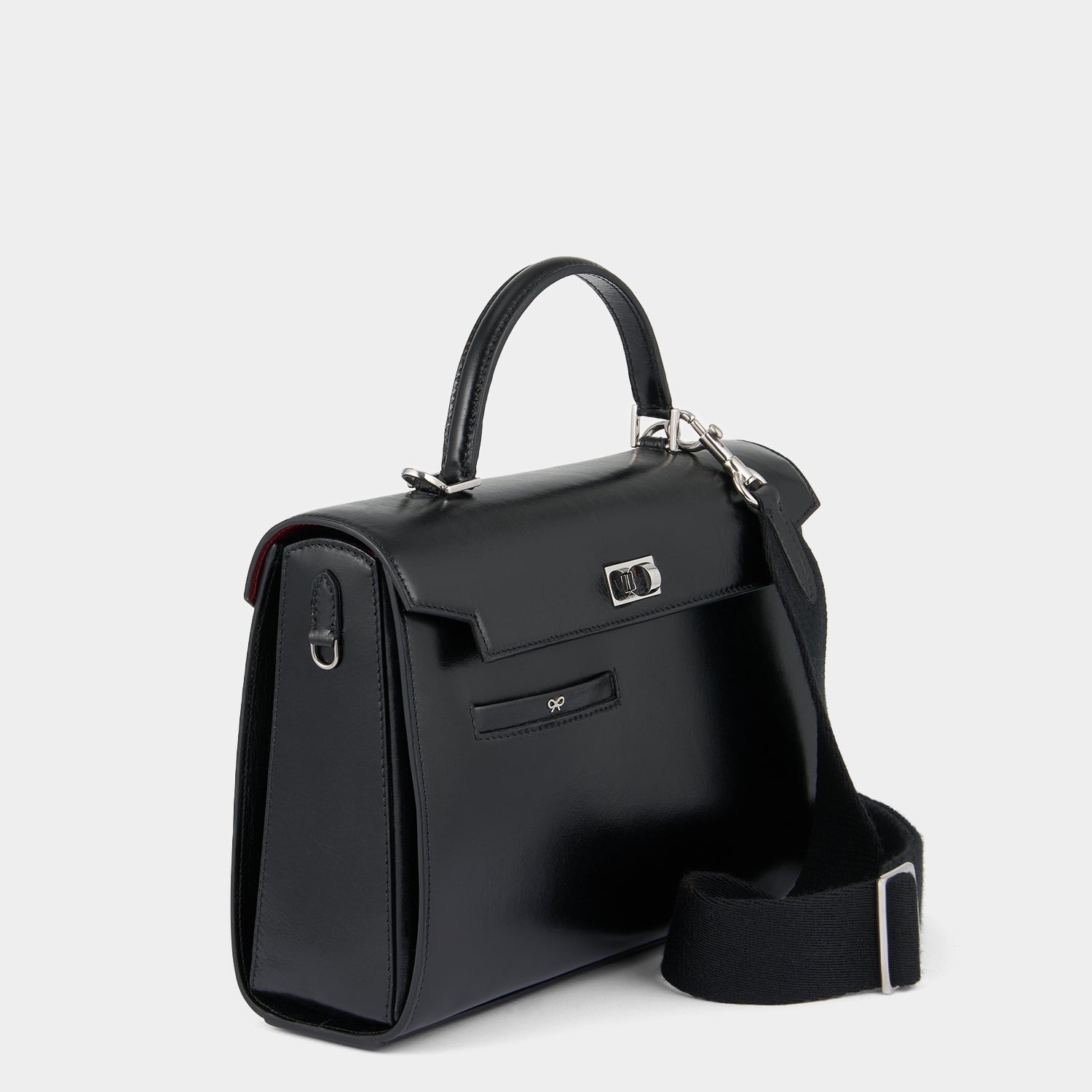 Mortimer Top Handle -

          
            Calf Leather in Glossy Black -
          

          Anya Hindmarch US
