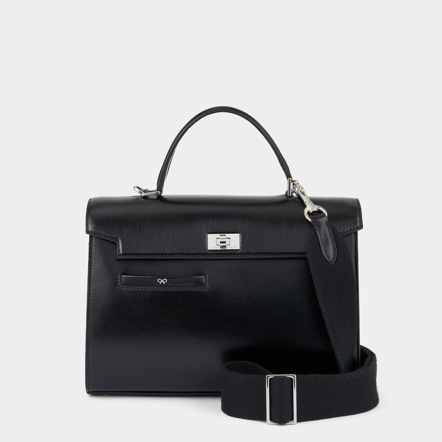 Mortimer Top Handle -

          
            Calf Leather in Glossy Black -
          

          Anya Hindmarch US
